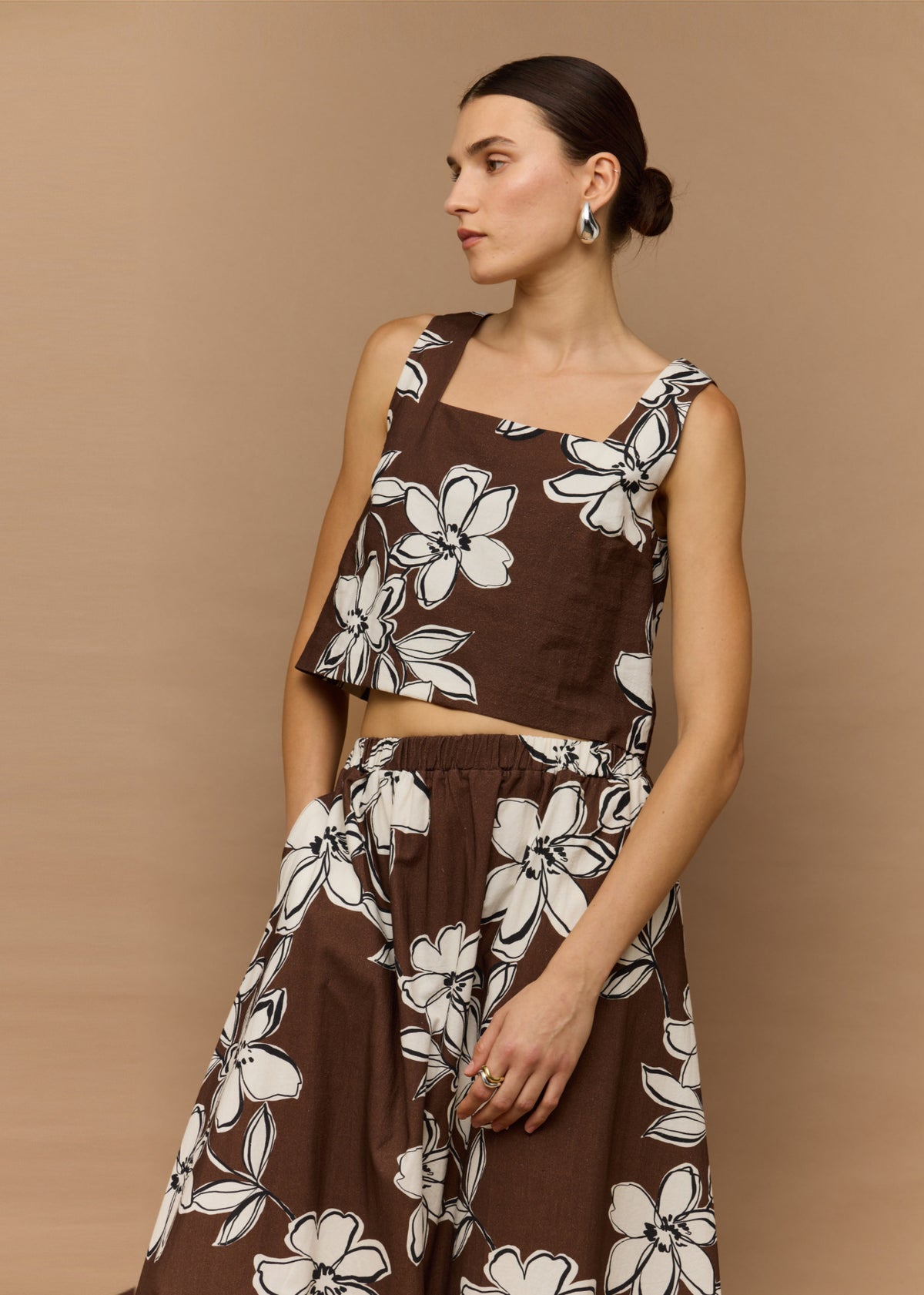Close-up of the Brown and White Cotton Floral Crop Top, showing a square neckline and wide straps.