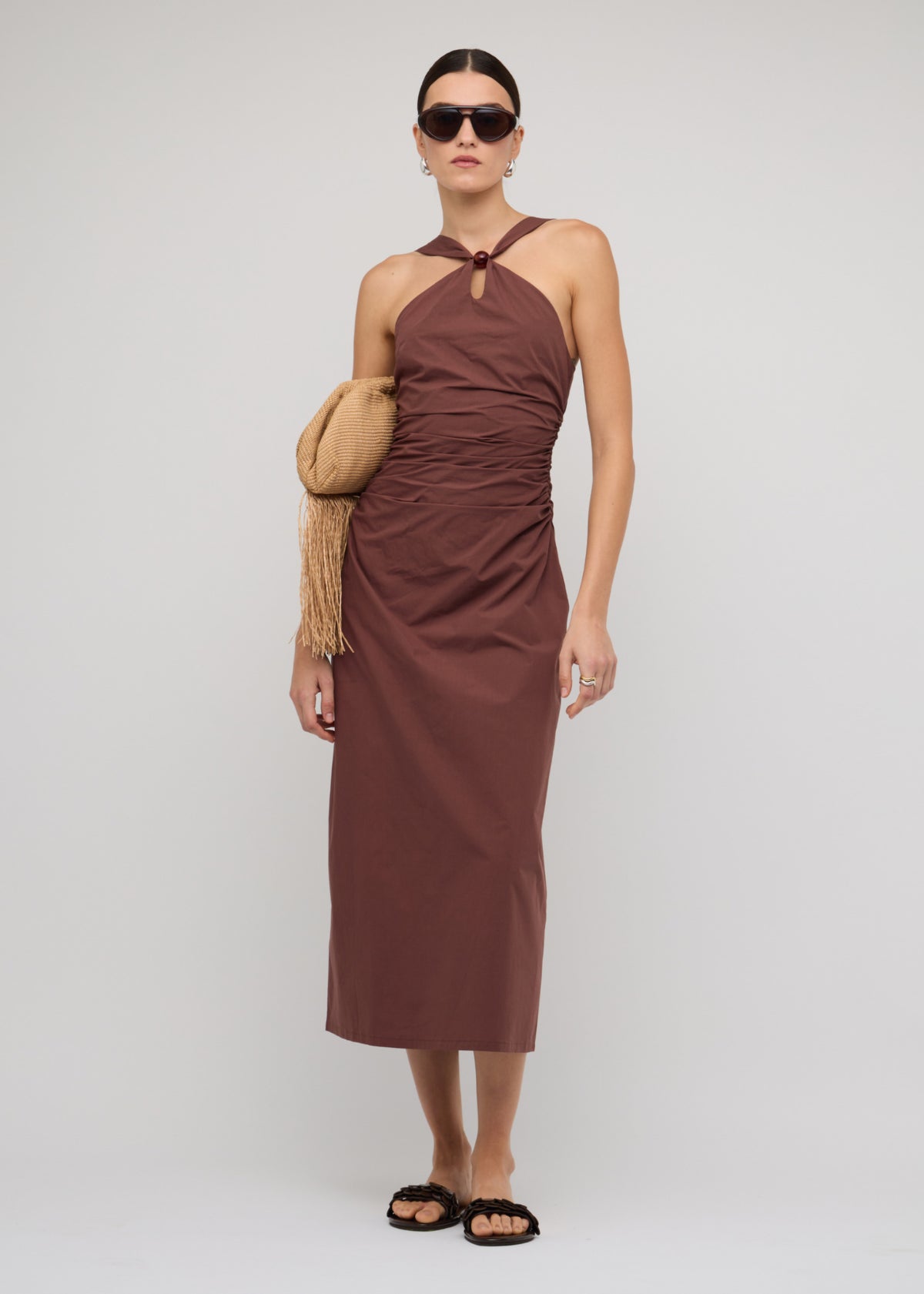 Model wearing Brown Cotton Bead Halter-Neck Ruched Midi Dress, showing a chocolate brown colourway and a 100% Cotton.