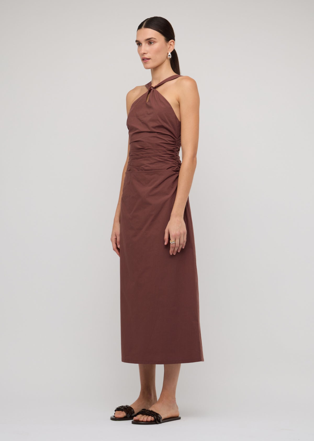 Model wearing Brown Cotton Bead Halter-Neck Ruched Midi Dress with a halter neckline with bead detail and a ruched bodice.