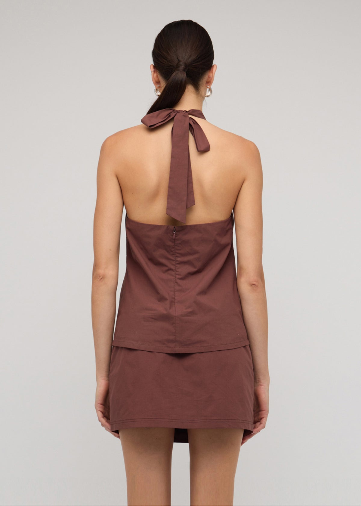 Back view of the Brown Cotton Bead Halter-Neck Top with an adjustable tie-back fastening and a 100% Cotton.