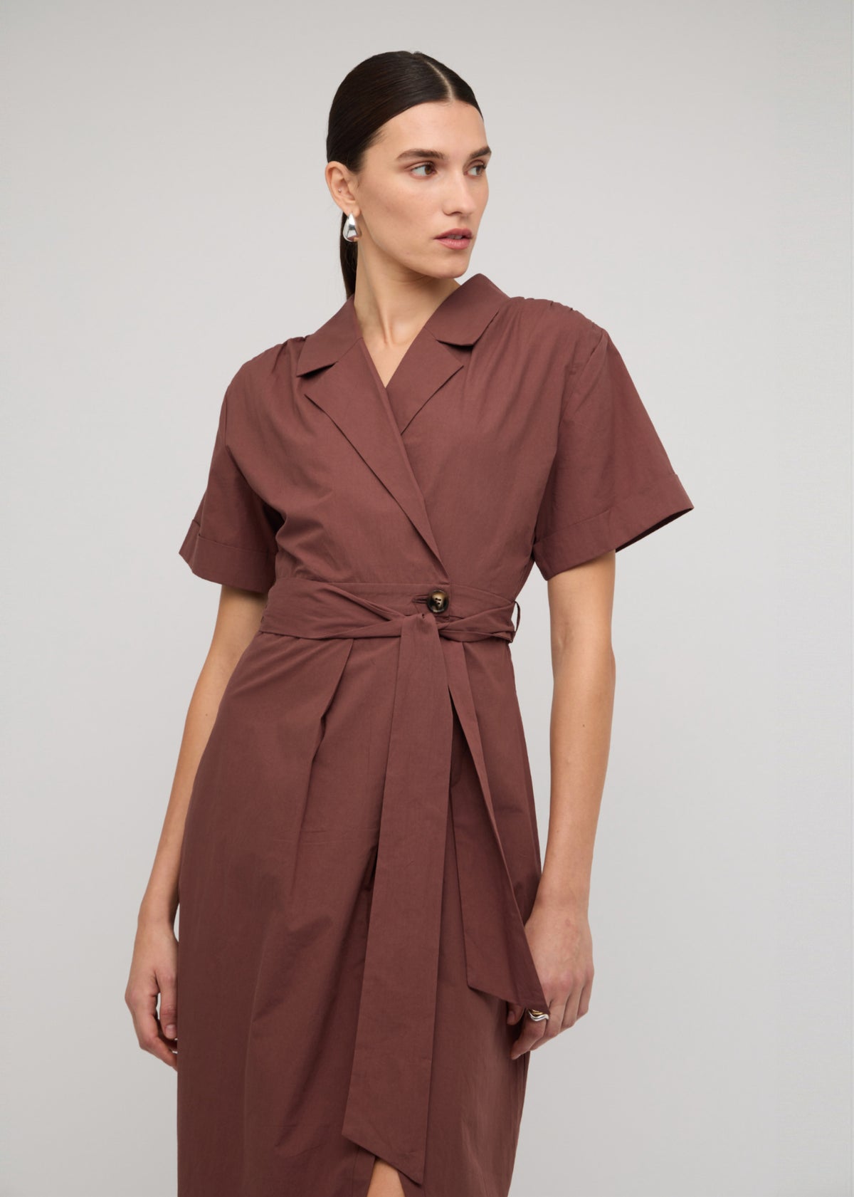 Close-up of the Brown Cotton Wrap Midi Shirt Dress, showing short sleeves and a wrap front with tie waist.