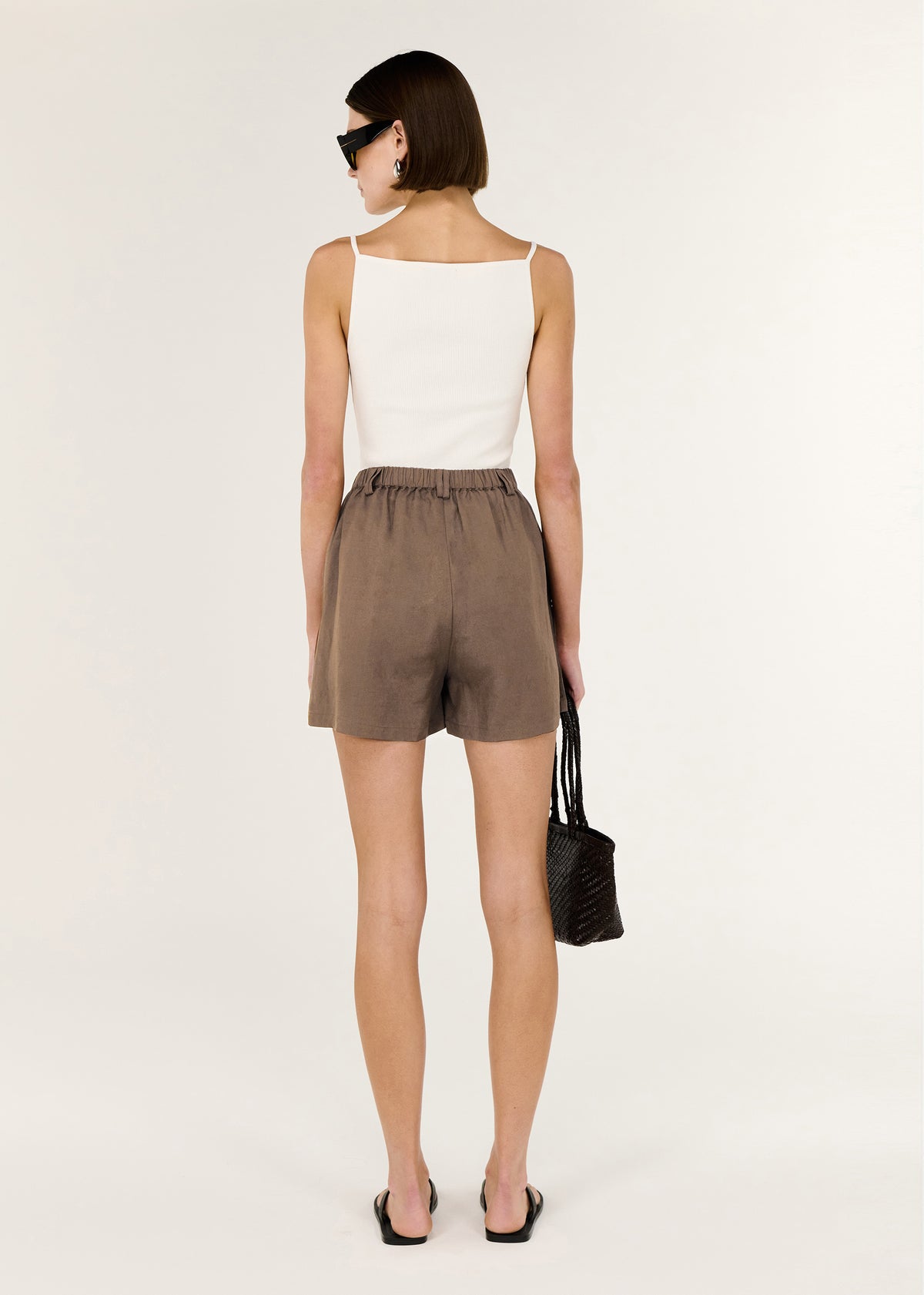 Back view of the Brown Linen Blend High Waisted Shorts with an elasticated back waistband and a high-waisted fit.