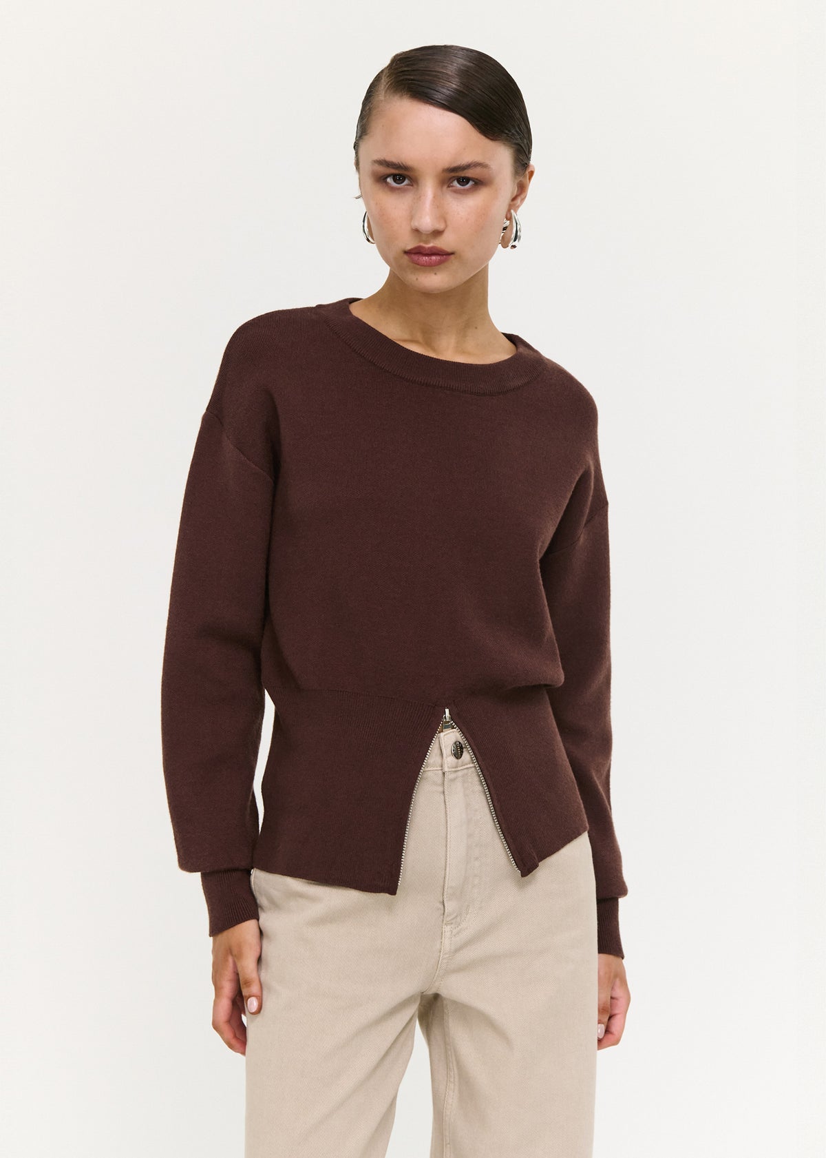 Close-up of the Brown Zip Detail Soft Crew Neck Knit, showing a crew neckline and long sleeves with fitted cuffs.