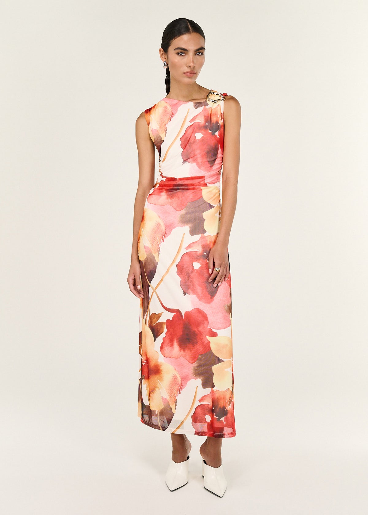 Model wearing Burnt Floral Mesh Midi Dress with a sleeveless silhouette and a gold hardware shoulder detailing.