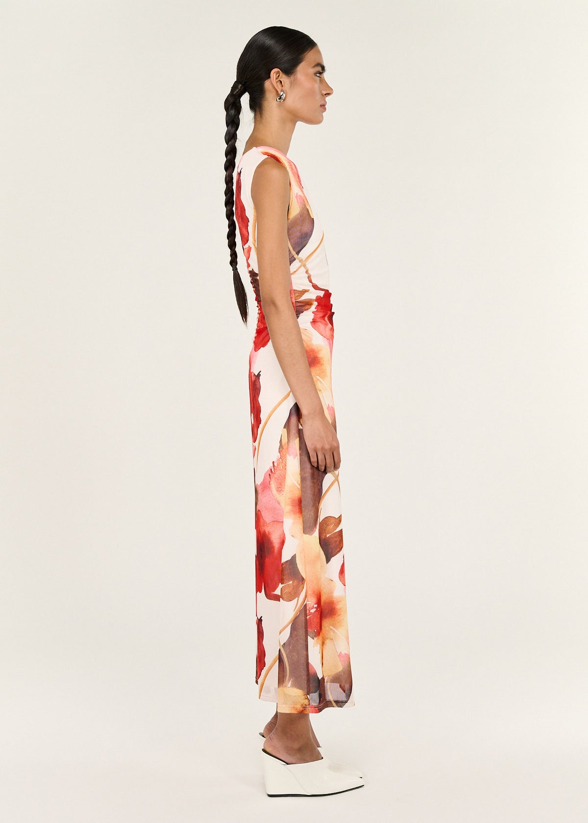 Side view of the Burnt Floral Mesh Midi Dress, showing a soft stretch mesh fabrication and an all-over placement floral print.