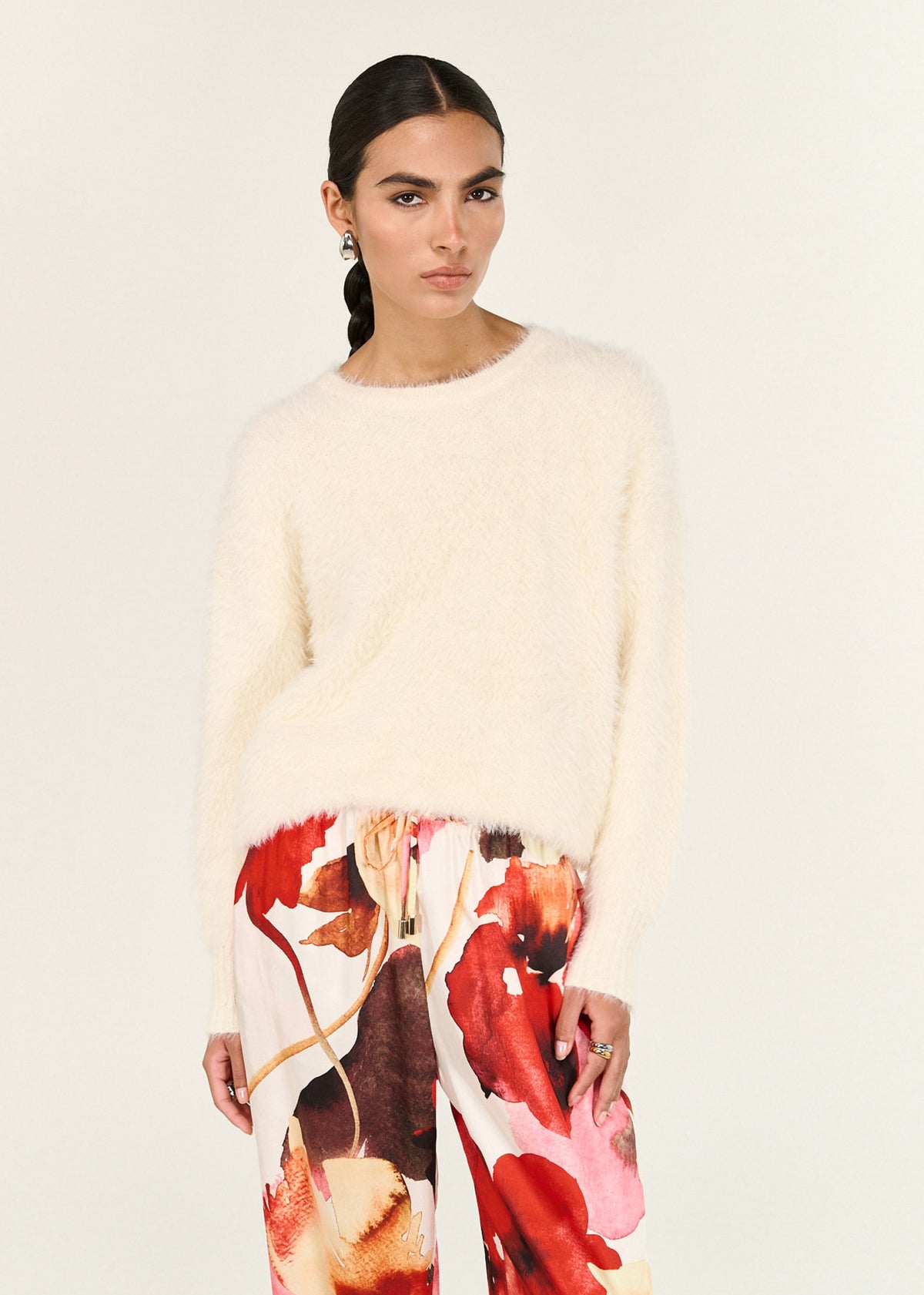 Close-up of the Burnt Floral Silky Wide Leg Pants, showing an elasticated waistband and an adjustable drawstring.