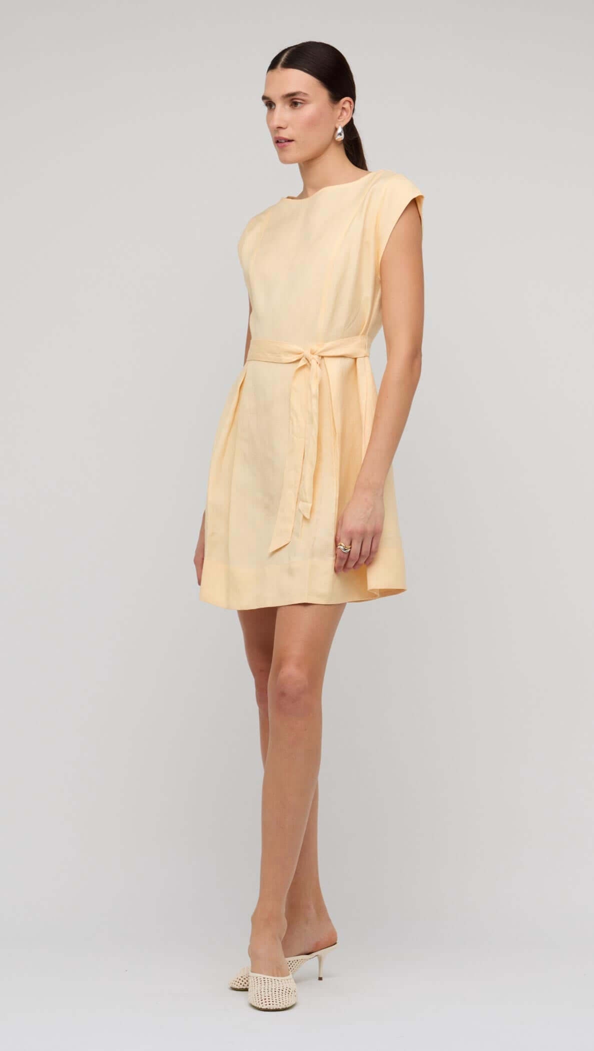 Butter Yellow Linen Mini Dress with cap sleeves and self-tie belt for a polished summer look.