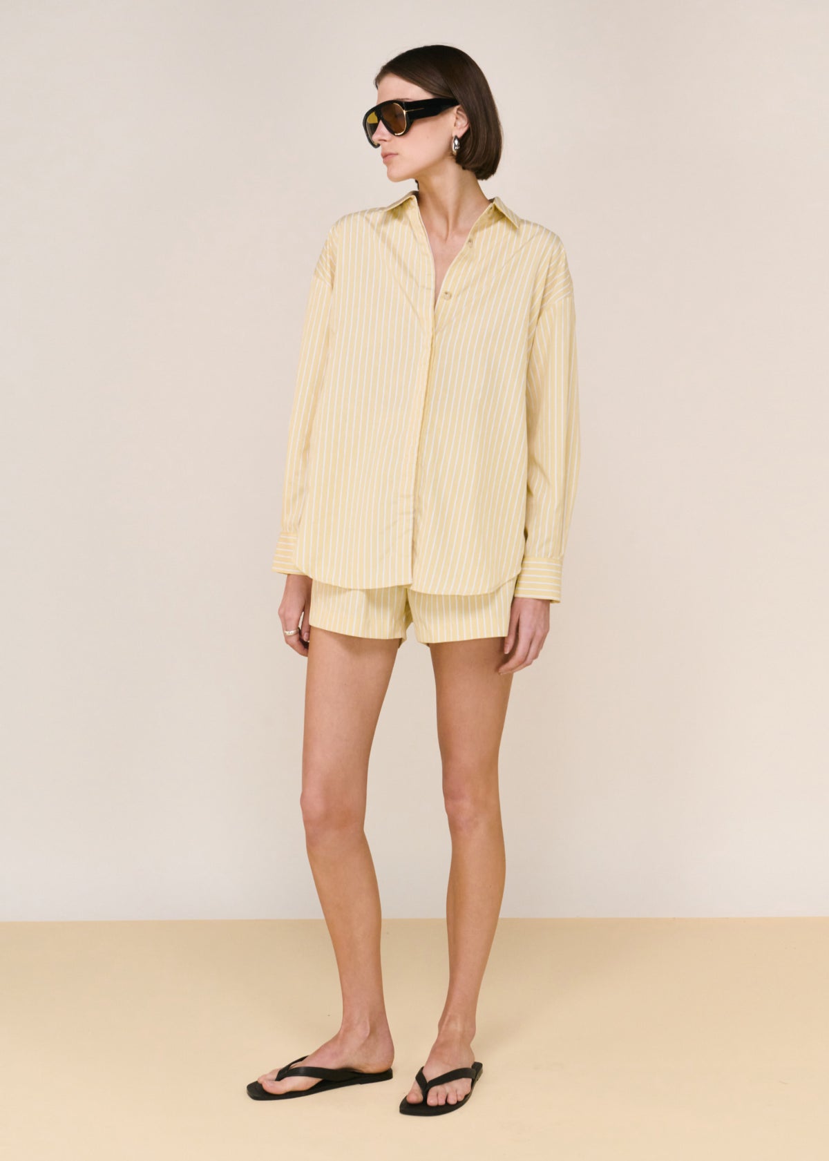 Model wearing Butter Yellow Striped Shirt with a lightweight and breathable feel.