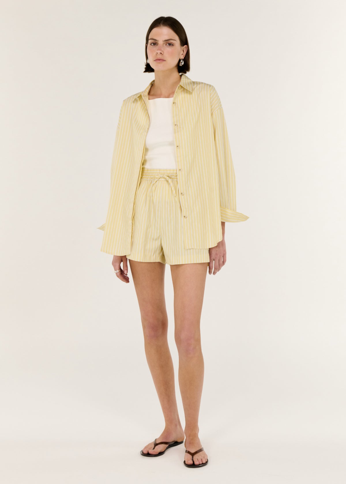 Model wearing Butter Yellow Striped Shirt, showing a lightweight and breathable feel.