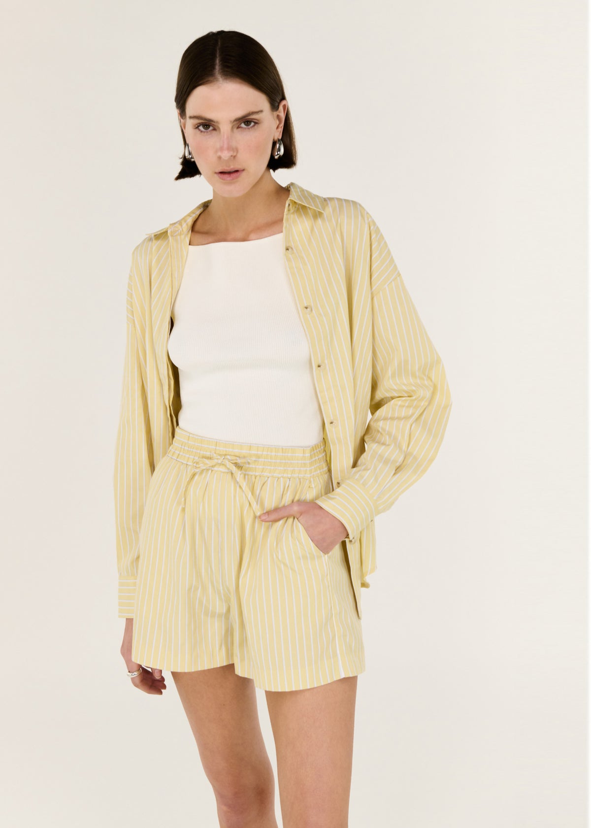 Close-up of the Butter Yellow Striped Shorts, showing a comfortable waist design and a clean, minimal silhouette.