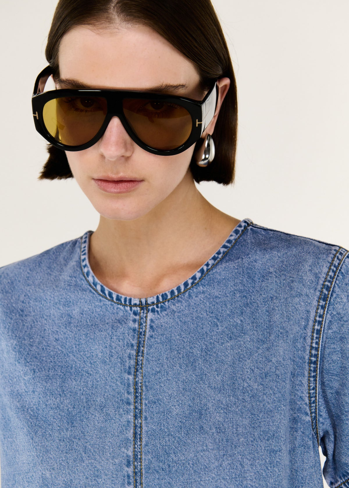 Close-up detail of the Chambray Lightweight Mini Dress, showing neckline.