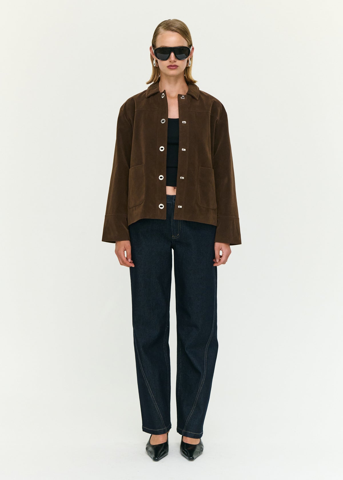 Model wearing Chocolate Brown Faux Suede Barn Jacket with a soft faux suede fabrication and a classic collar neckline.