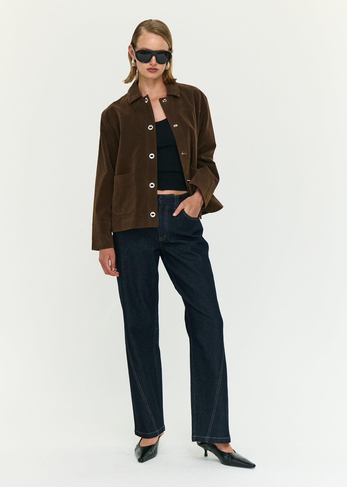 Model wearing Chocolate Brown Faux Suede Barn Jacket with a relaxed fit and a hip length, turned to the side.