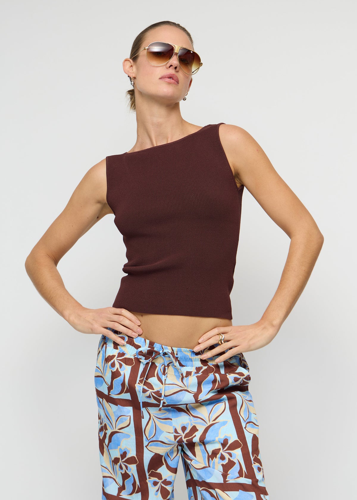 Close-up of Chocolate Brown Reversible Knit Tank Top with a reversible design: wear and a fitted rib knit silhouette.