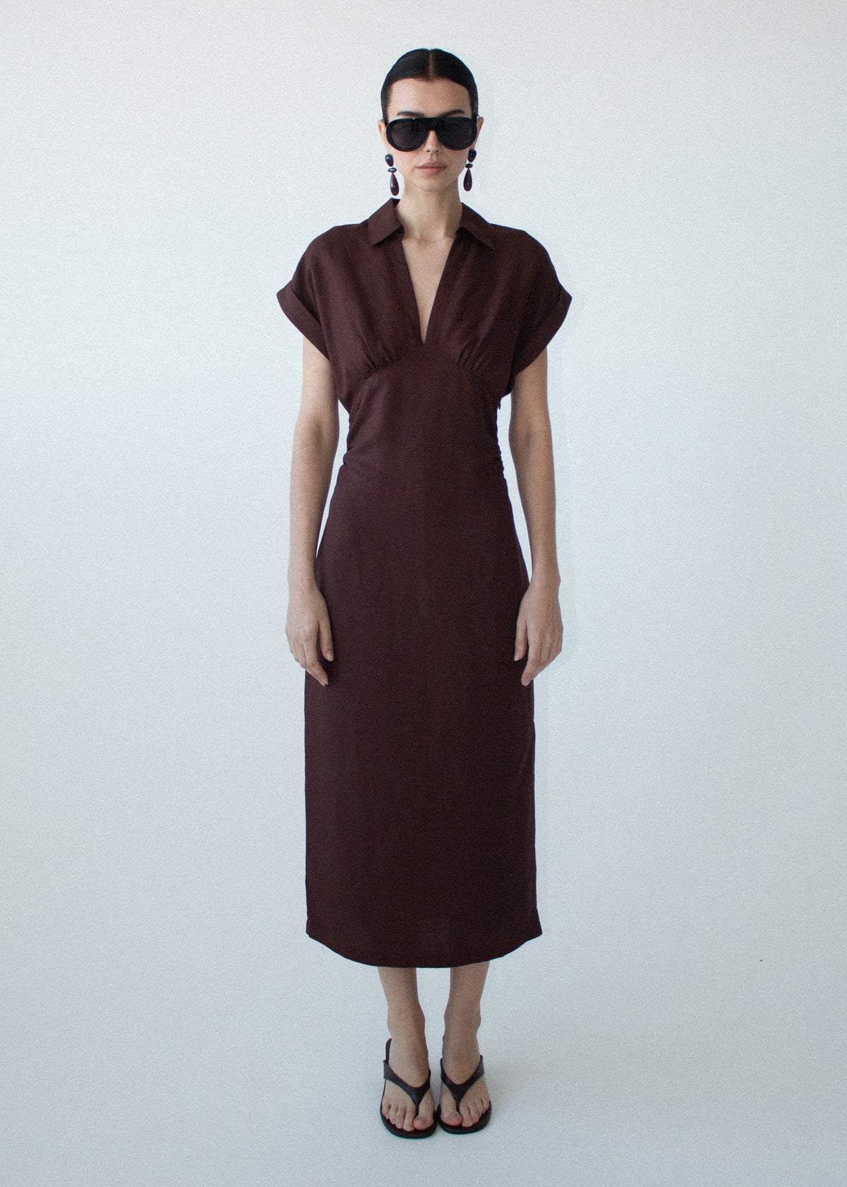 Model wearing Chocolate Linen Blend Collared Midi Dress with an a-line silhouette and a midi length.