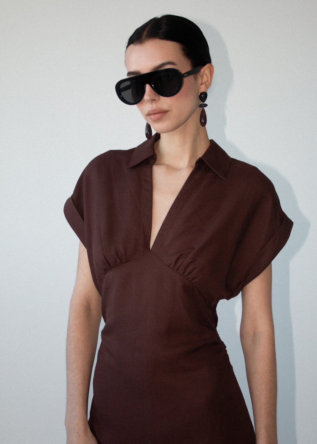 Close-up of the Chocolate Linen Blend Collared Midi Dress, showing a collared V-neckline and cap sleeves.