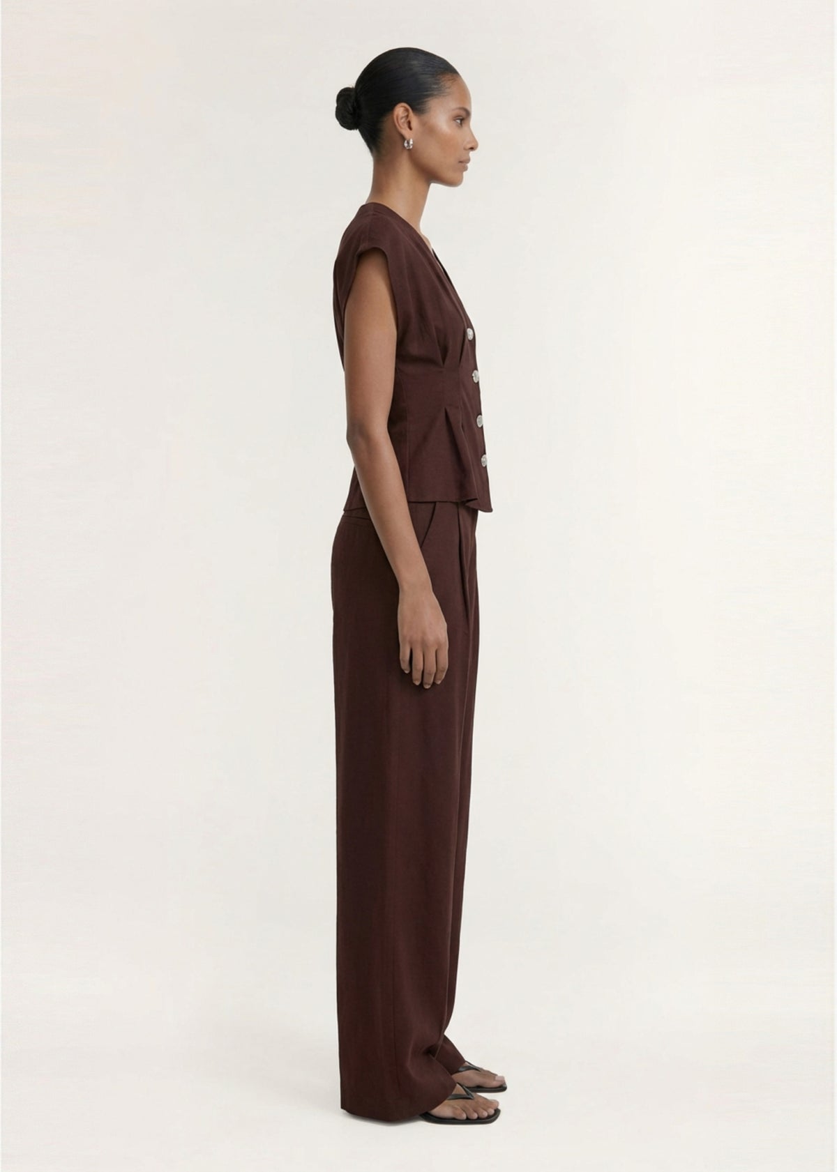 Side view of the Chocolate Linen Blend V-Neck Cropped Top, showing dolman sleeves and a button-through front.