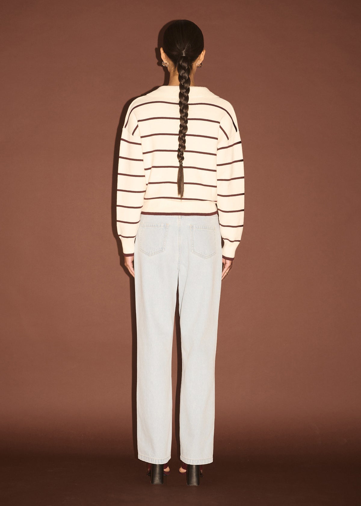 Back view of the Chocolate Stripe Polo Knit Jumper with an open polo neckline and a soft knit fabrication.