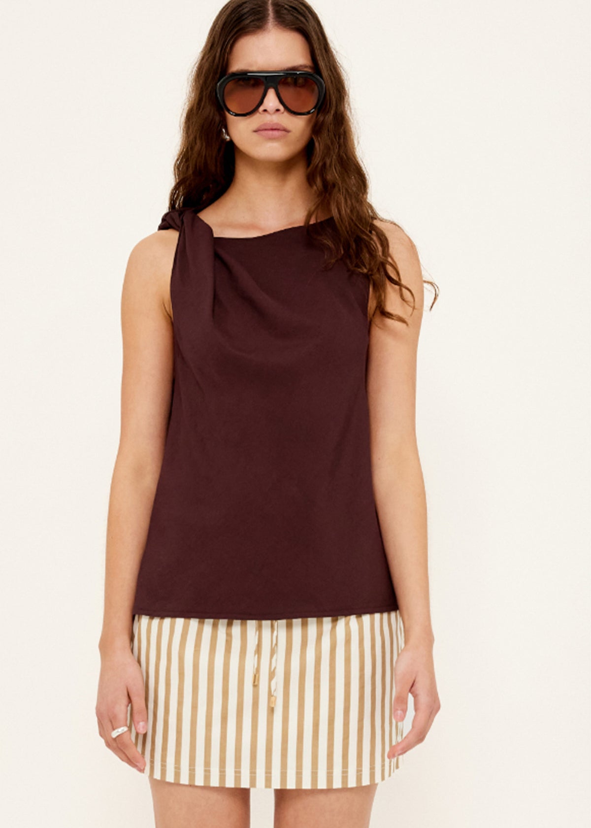 Close-up of the Chocolate Twist Top, showing a relaxed sleeveless fit and a soft cowl neckline.