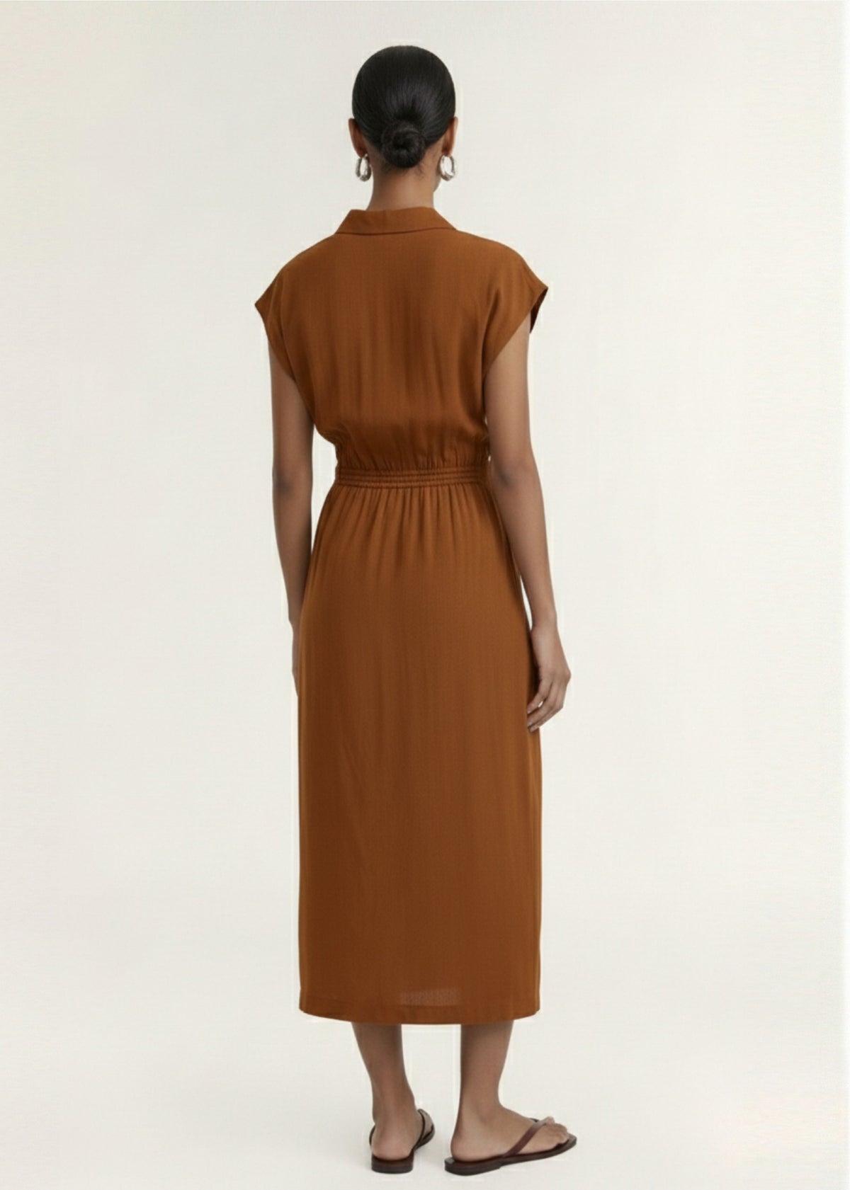 Back view of the Copper Draped Wrap Midi Dress, showing an open collar neckline and a wrap front with self-tie waist.