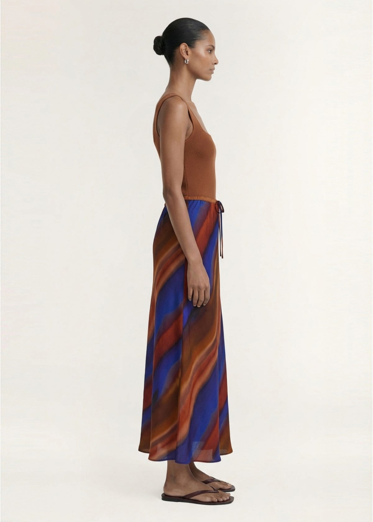 Side view of the Copper Square Neck Ribbed Knit Tank, showing a pull-on style and a ribbed knit fabrication.