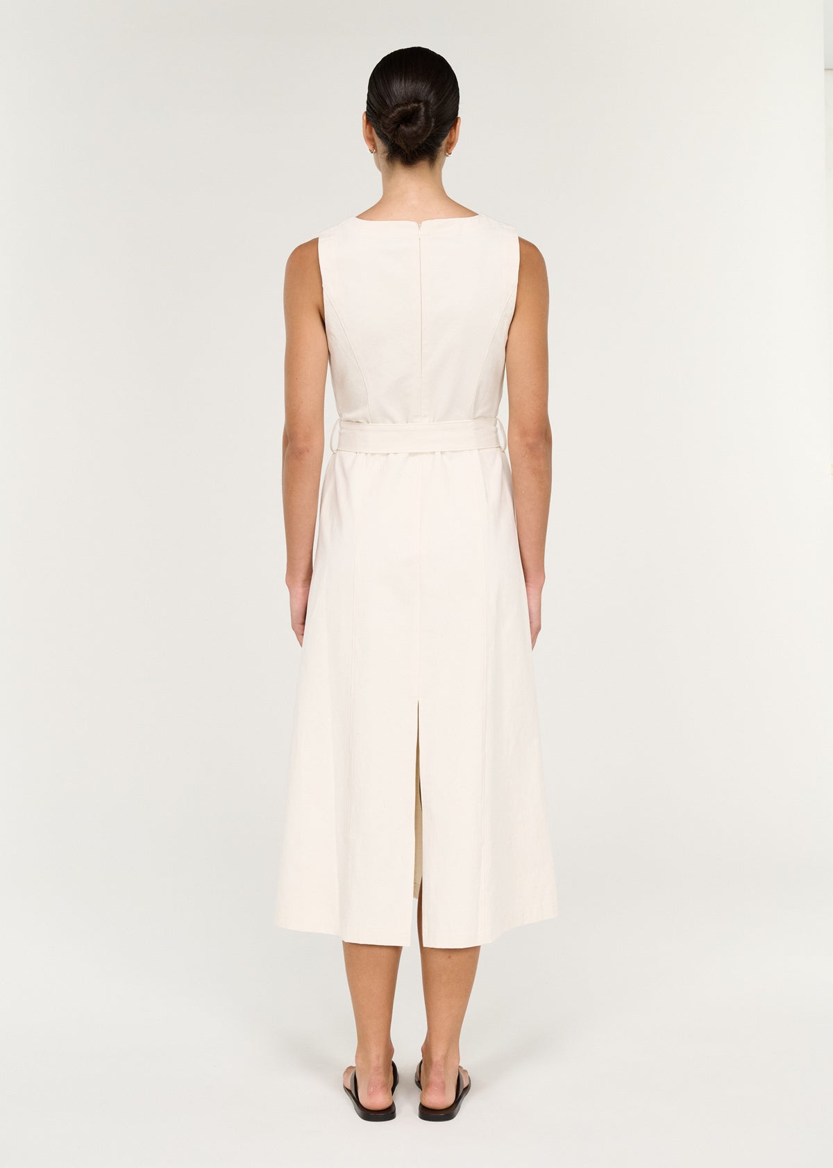 Back view of the Cotton Belted Wrap Midi Dress in Cream with a centre back zip closure and a centre back skirt split.
