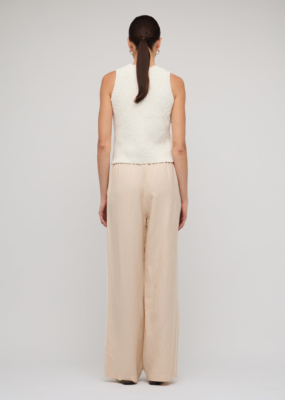 Back view of the Cotton-Blend Knit Tank Top In White, showing a sleeveless cut and a crew neckline.