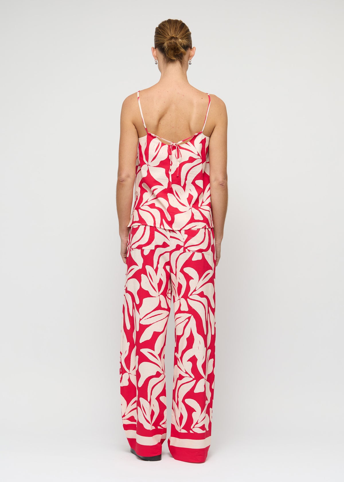 Back view of the Cotton Blend Red and White Floral Print Cami Top, showing adjustable tie-back straps.