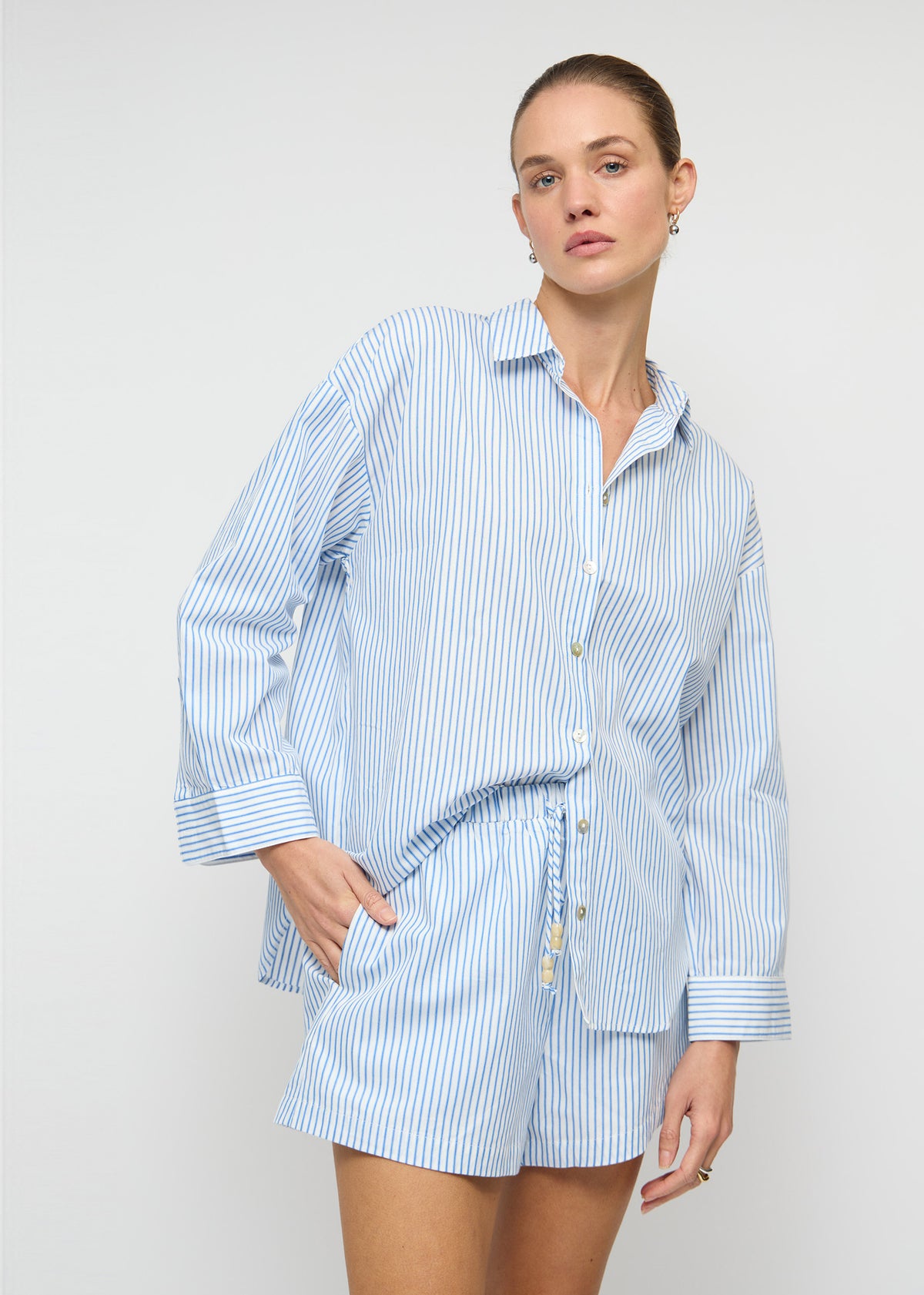 Close-up of the Cotton Blue and White Oversized Shirt, showing a button-through front.