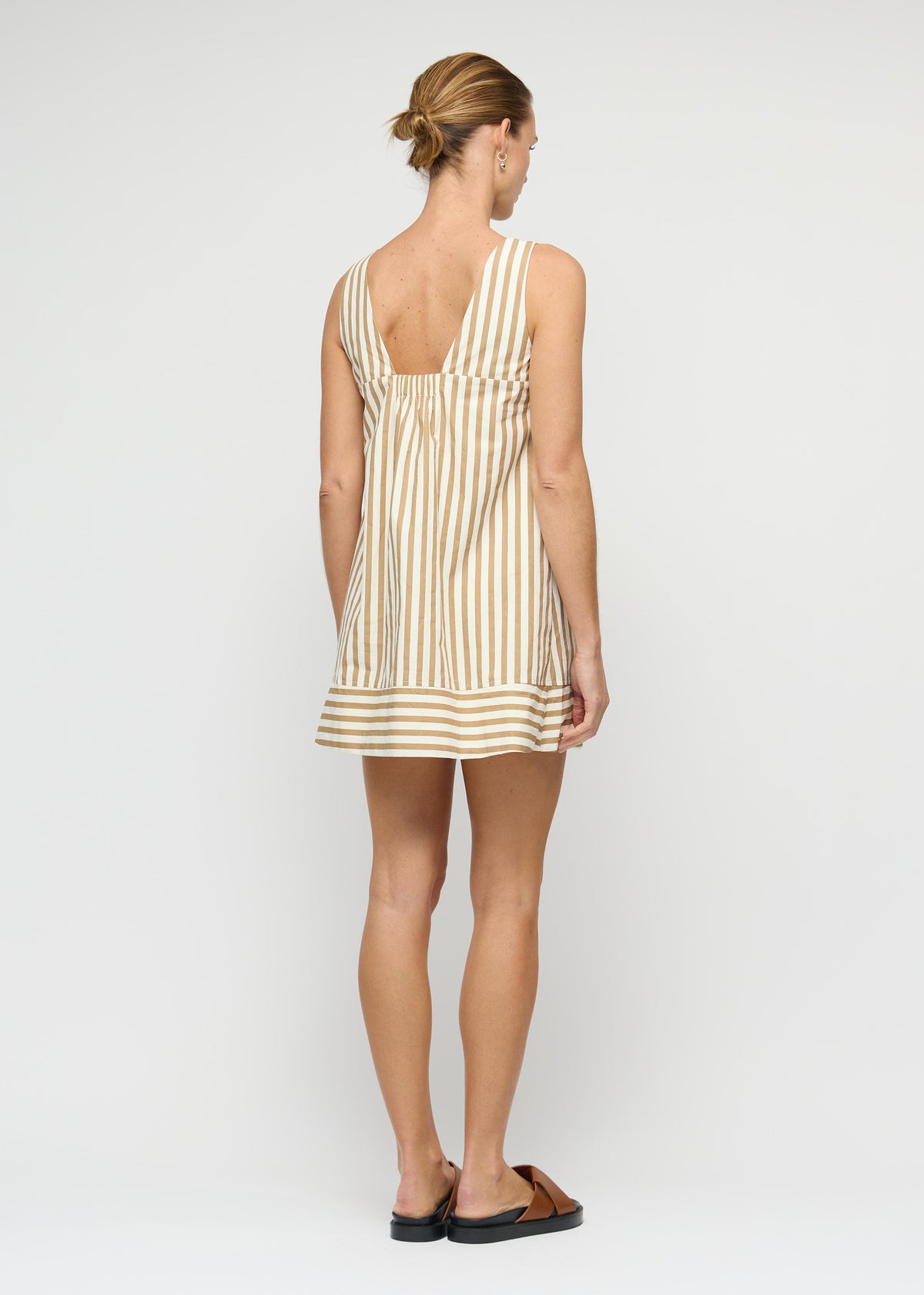 Back view of the Cotton Stripe Mini Shirt Dress with a scoop neckline and deep V-back.