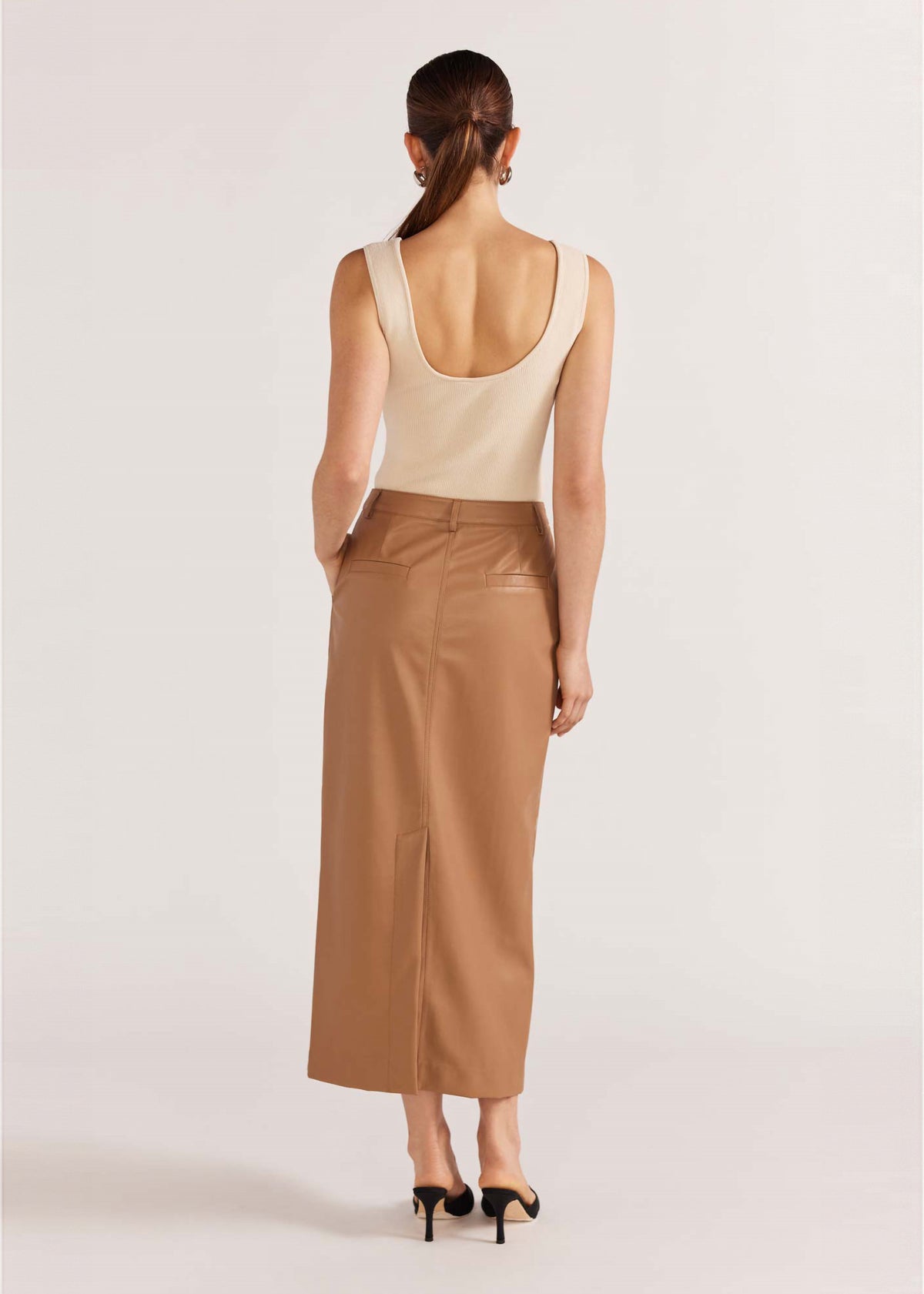 Back view of the Cynthia Pu Midi Skirt with a back vent.