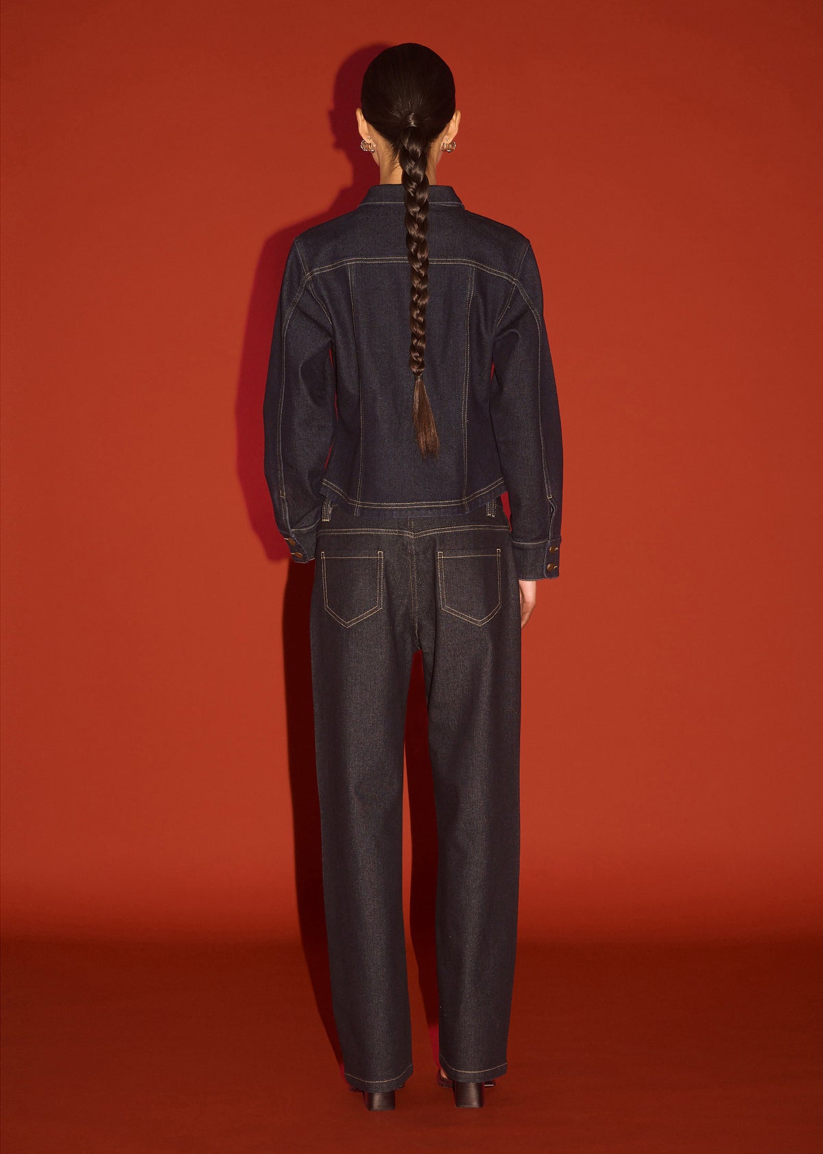 Back view of the Dark Wash Straight Leg Jeans with a mid-rise waist and a straight leg silhouette.