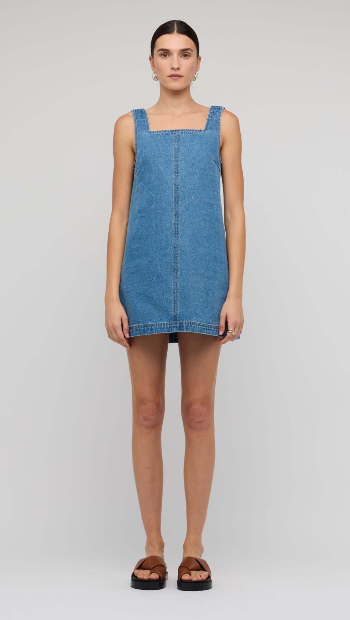 Denim Square Neck Mini Dress showcased on a model, perfect for summer with a relaxed A-line silhouette.