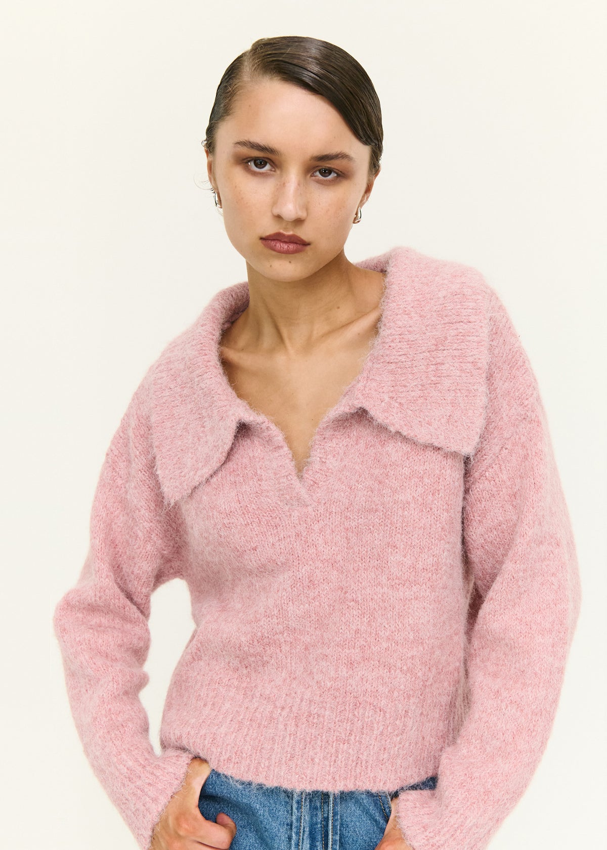 Close-up of the Dusky Pink Fluffy Knit Polo Jumper, showing an oversized polo collar and an open neckline detail.