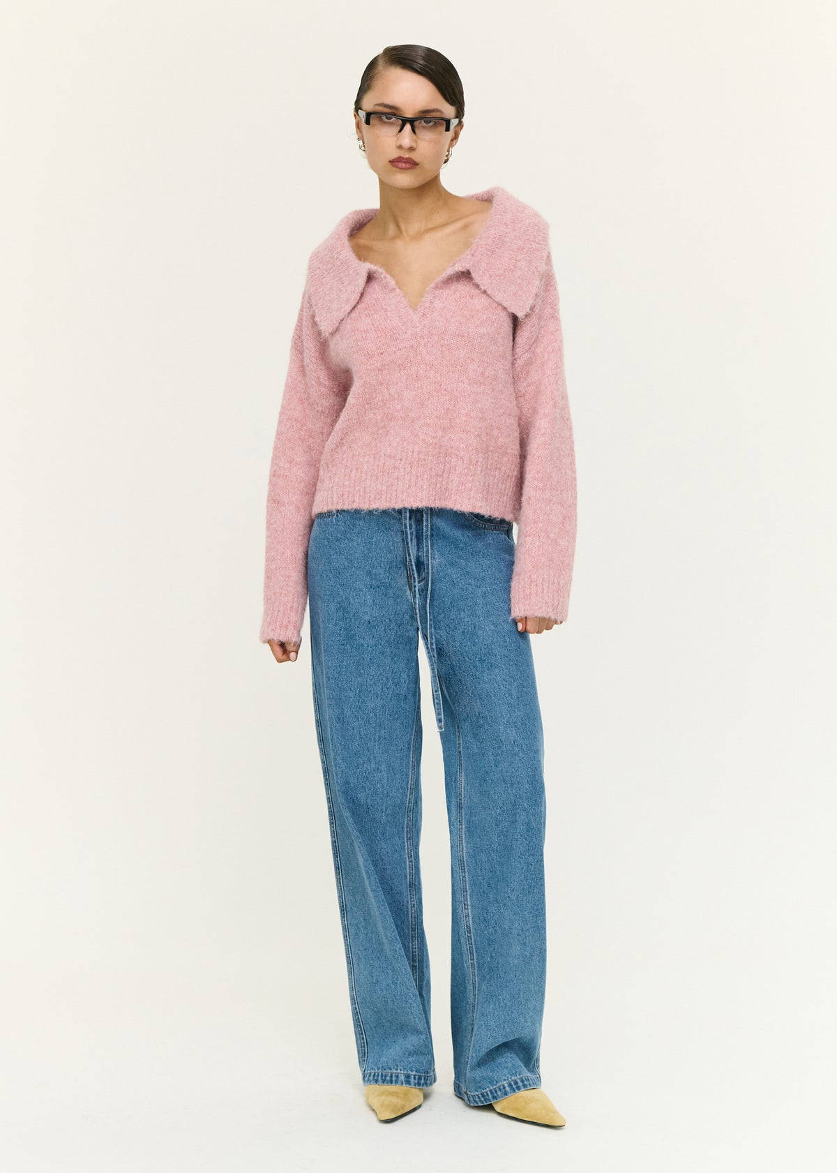 Model wearing Dusky Pink Fluffy Knit Polo Jumper, showing a soft-touch finish and a soft fluffy knit fabrication.