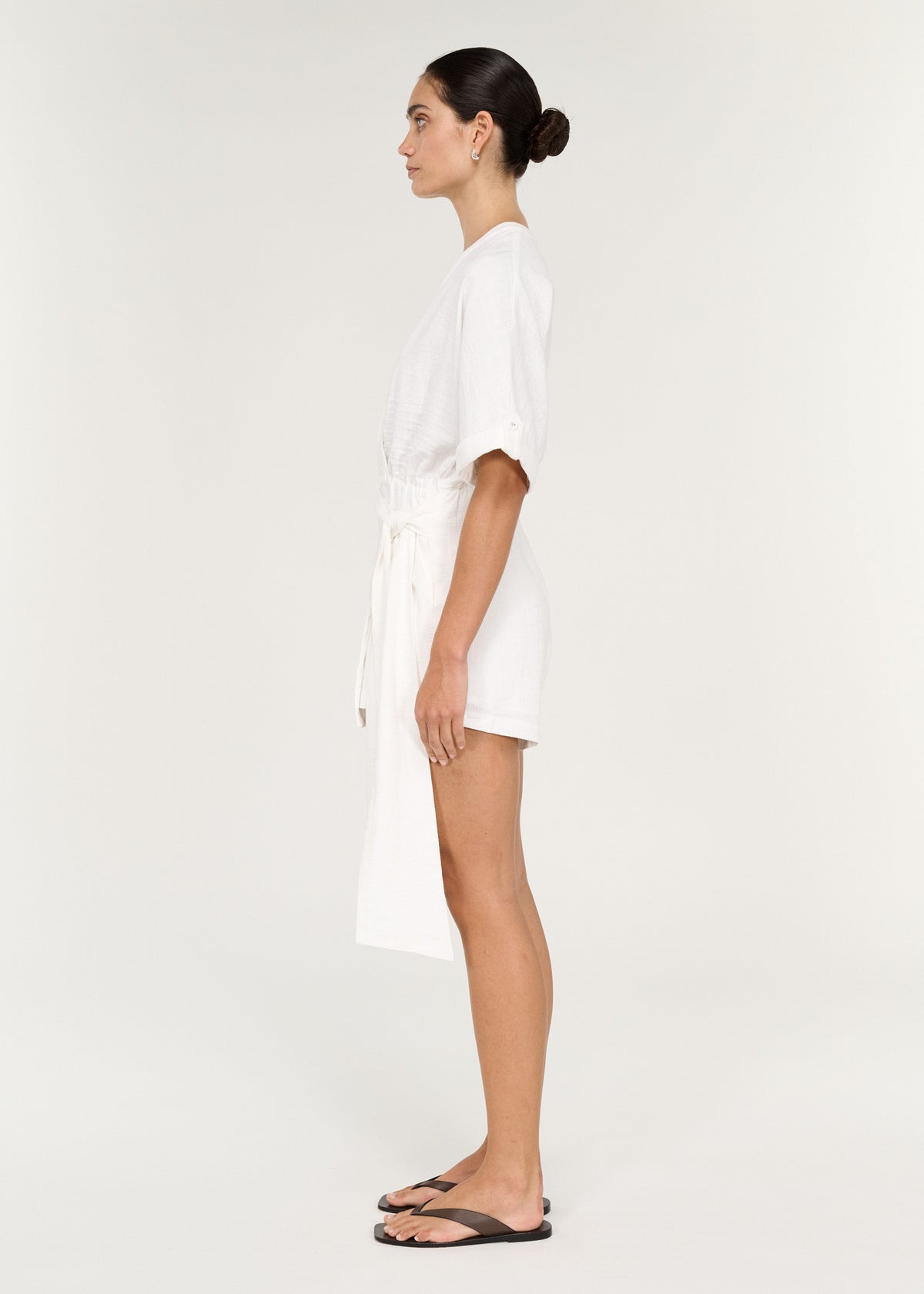 Cotton Linen Blend Wrap Playsuit with Tie Detail shown in white, featuring a wrap V-neckline and side split.