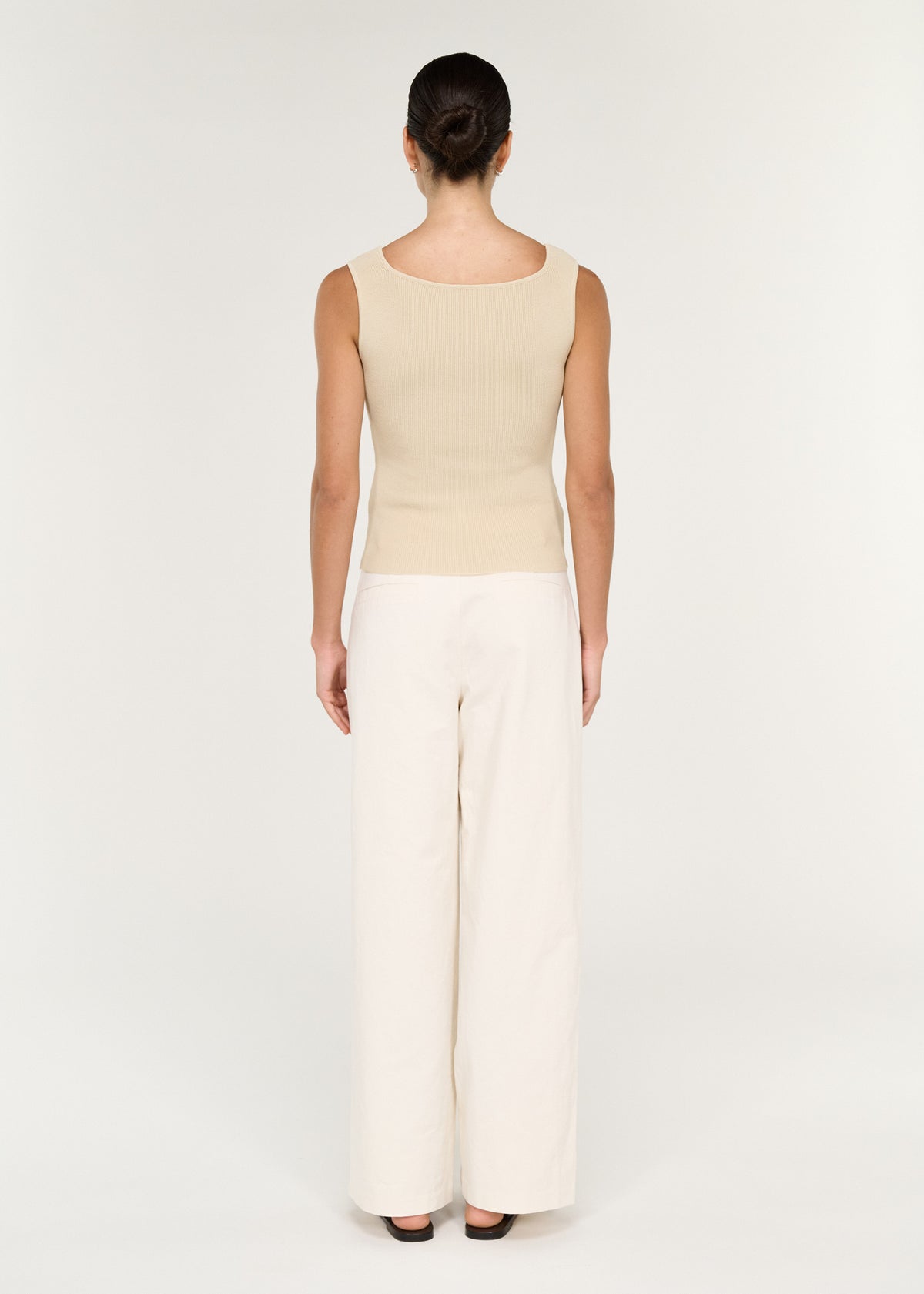 Back view of the Fine Rib Knit Reversible Tank in Ecru, showing a fine ribbed knit fabrication and a reversible design.
