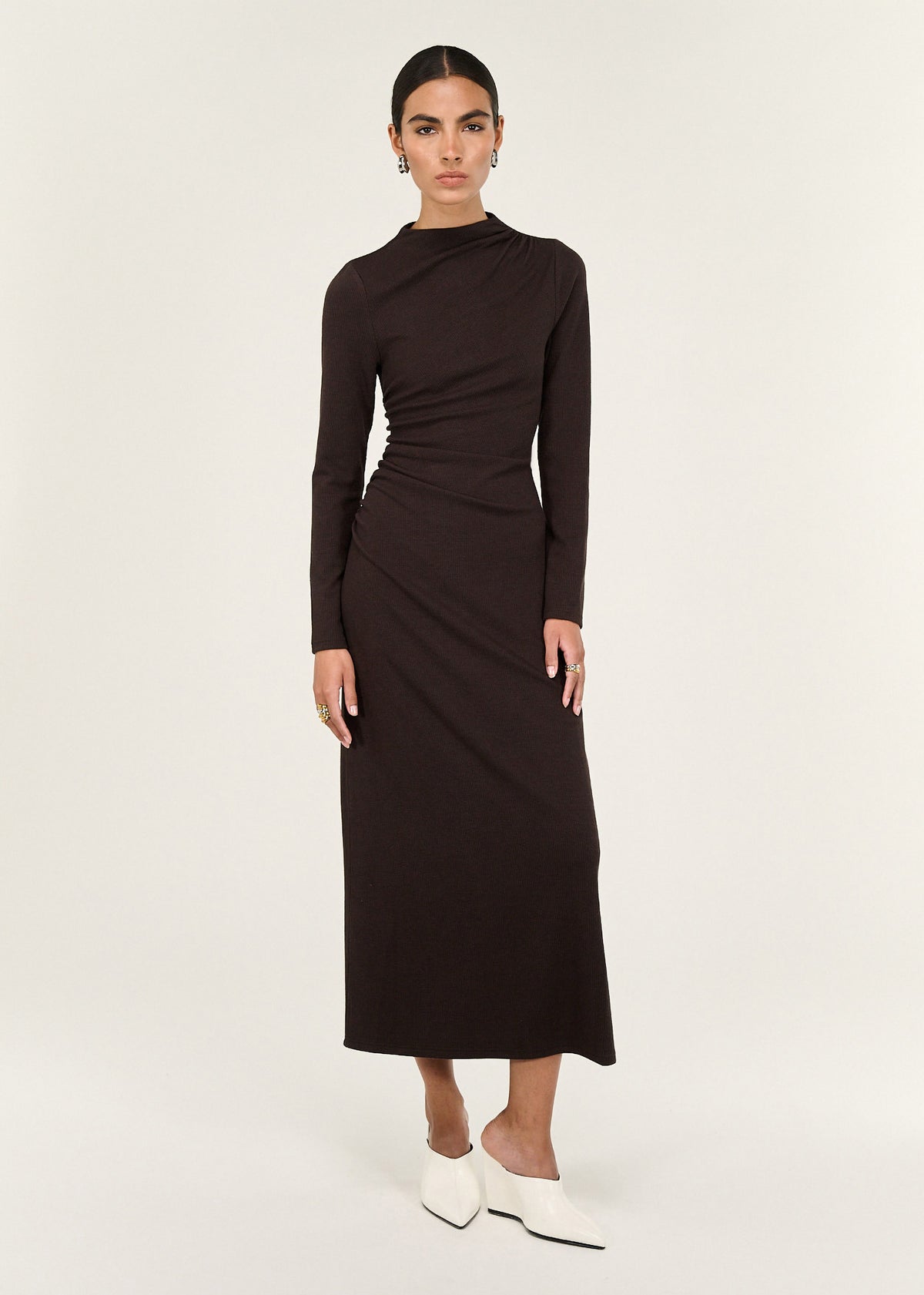 Model wearing Gather Detail Long Sleeve Jersey Midi Dress in Chocolate with a soft stretch fabrication and a fitted silhouette.