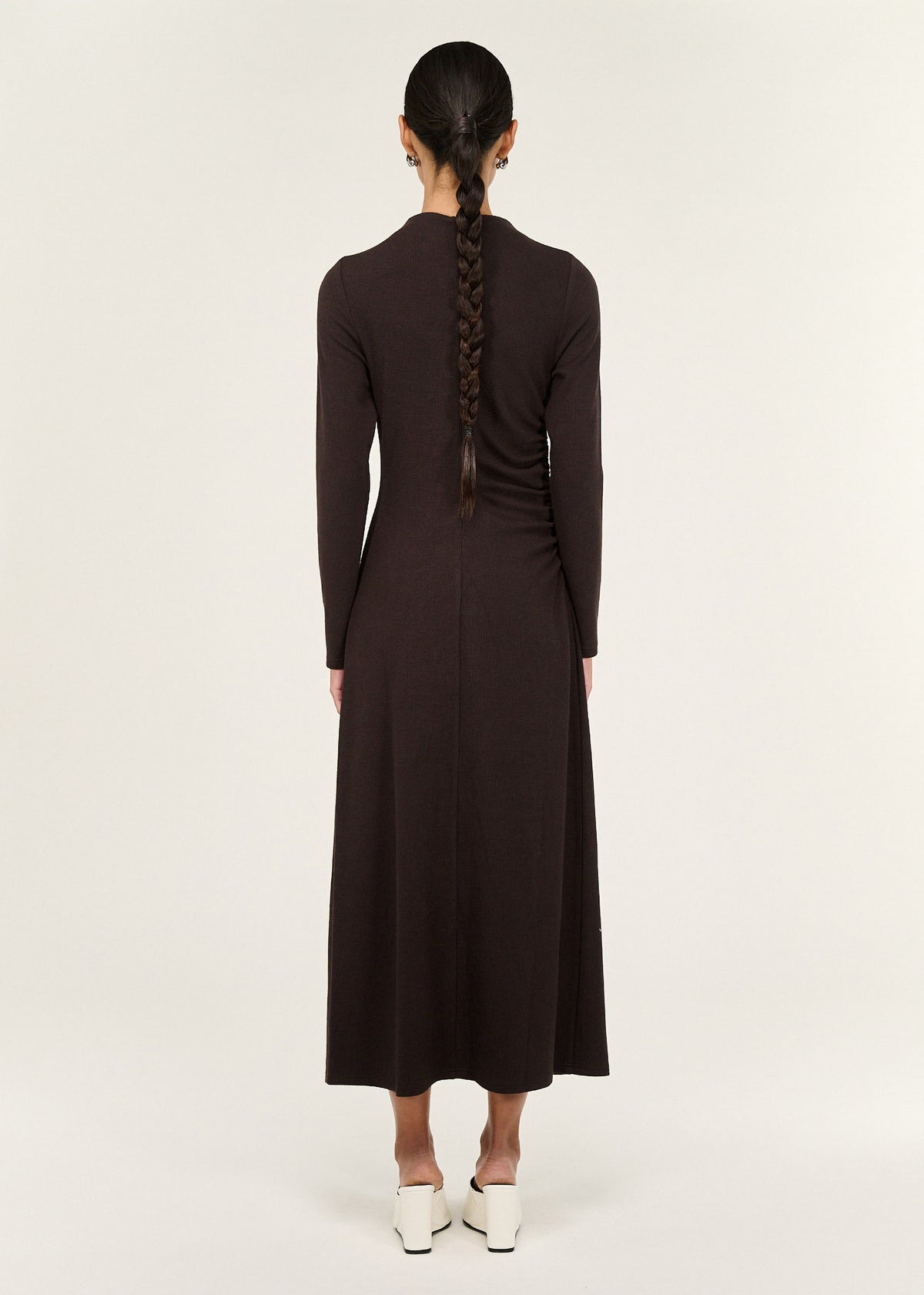 Back view of the Gather Detail Long Sleeve Jersey Midi Dress in Chocolate, showing a soft stretch fabrication and a fitted silhouette.