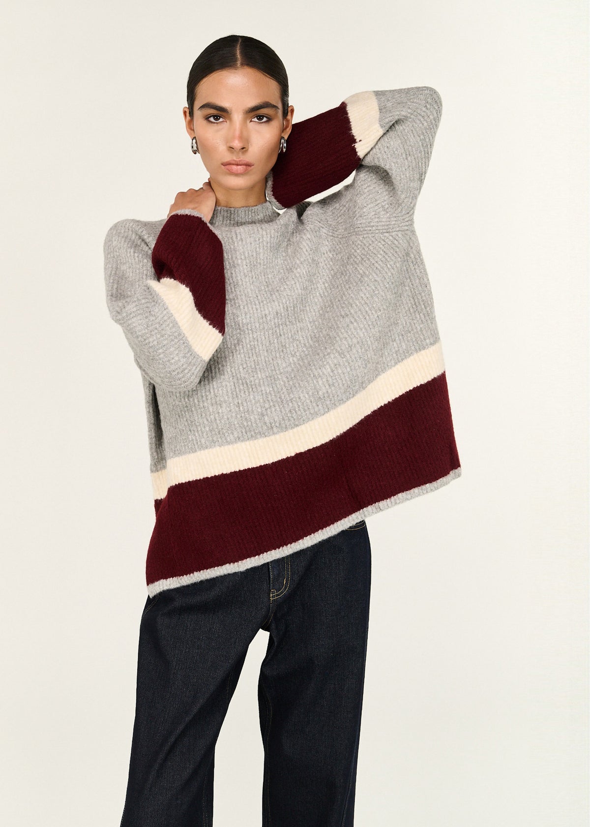Close-up of the Grey Raglan Heavy Knit Jumper, showing a crew neckline and a raglan sleeve construction.