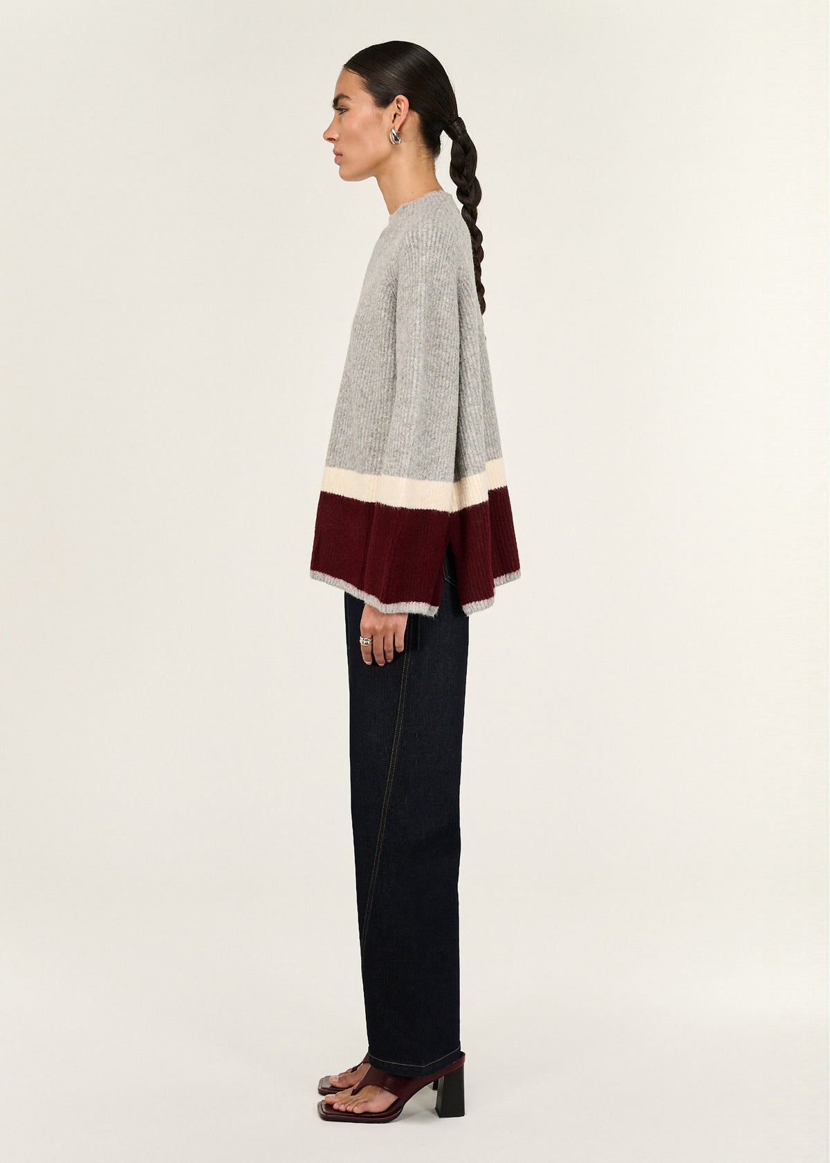 Side view of the Grey Raglan Heavy Knit Jumper, showing a crew neckline and a raglan sleeve construction.