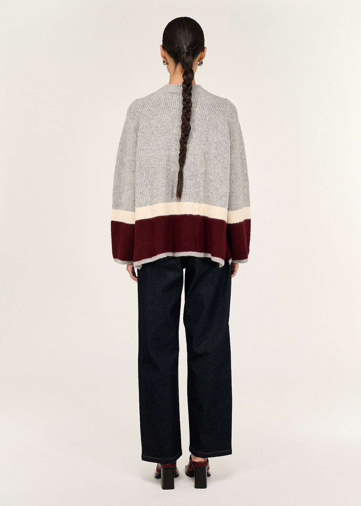 Back view of the Grey Raglan Heavy Knit Jumper with a crew neckline and a raglan sleeve construction.