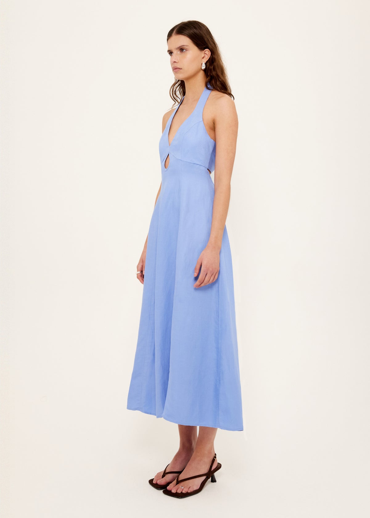 Side view of the Jacaranda Tencel Linen Blend Halter Midi Dress, showing a front keyhole cut-out and a midi length.