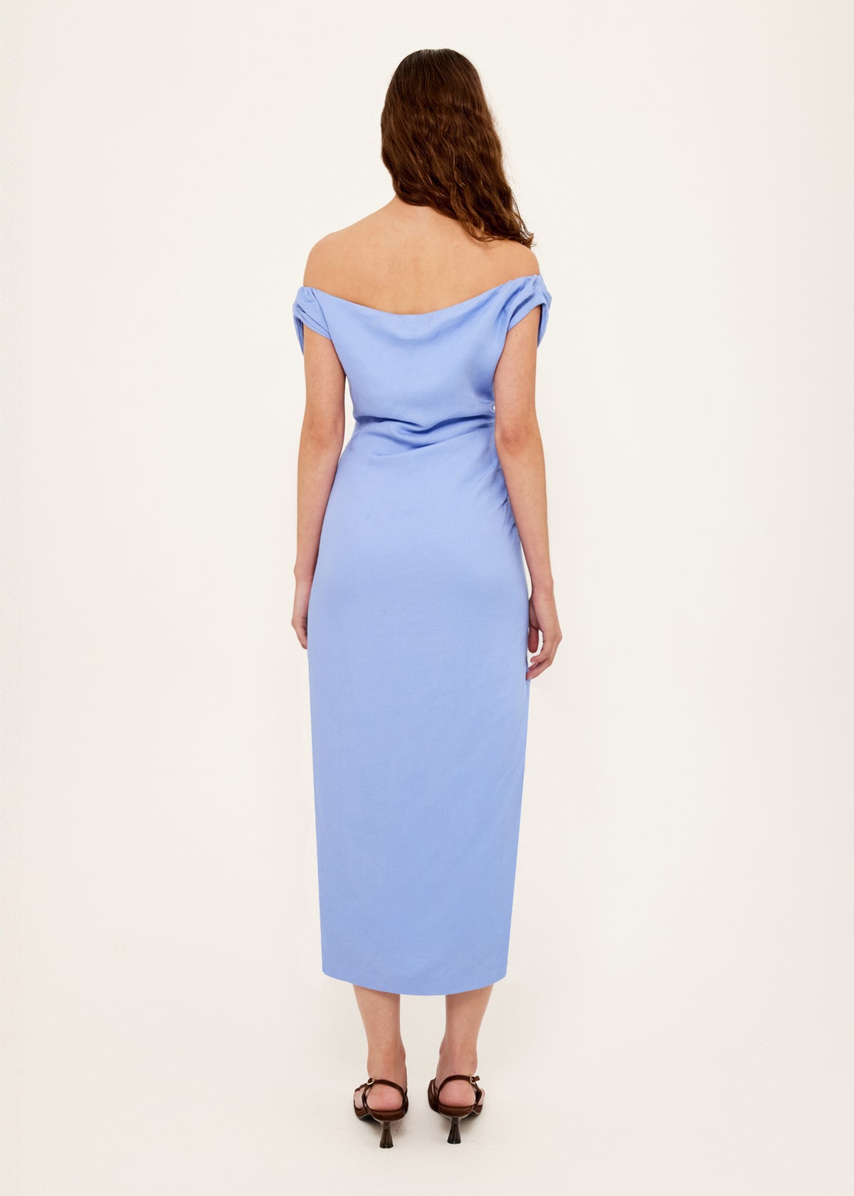 Back view of the Jacaranda Tencel Linen Blend Off-Shoulder Midi Dress with an off-shoulder neckline with draped detailing.
