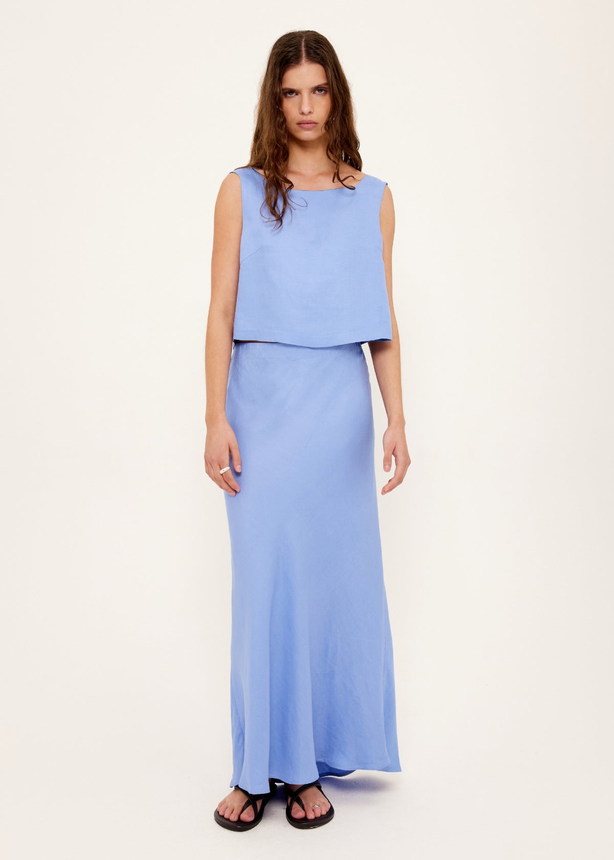 Model wearing Jacaranda Tencel Linen Blend Top with a textured linen-blend fabric and a fully lined.