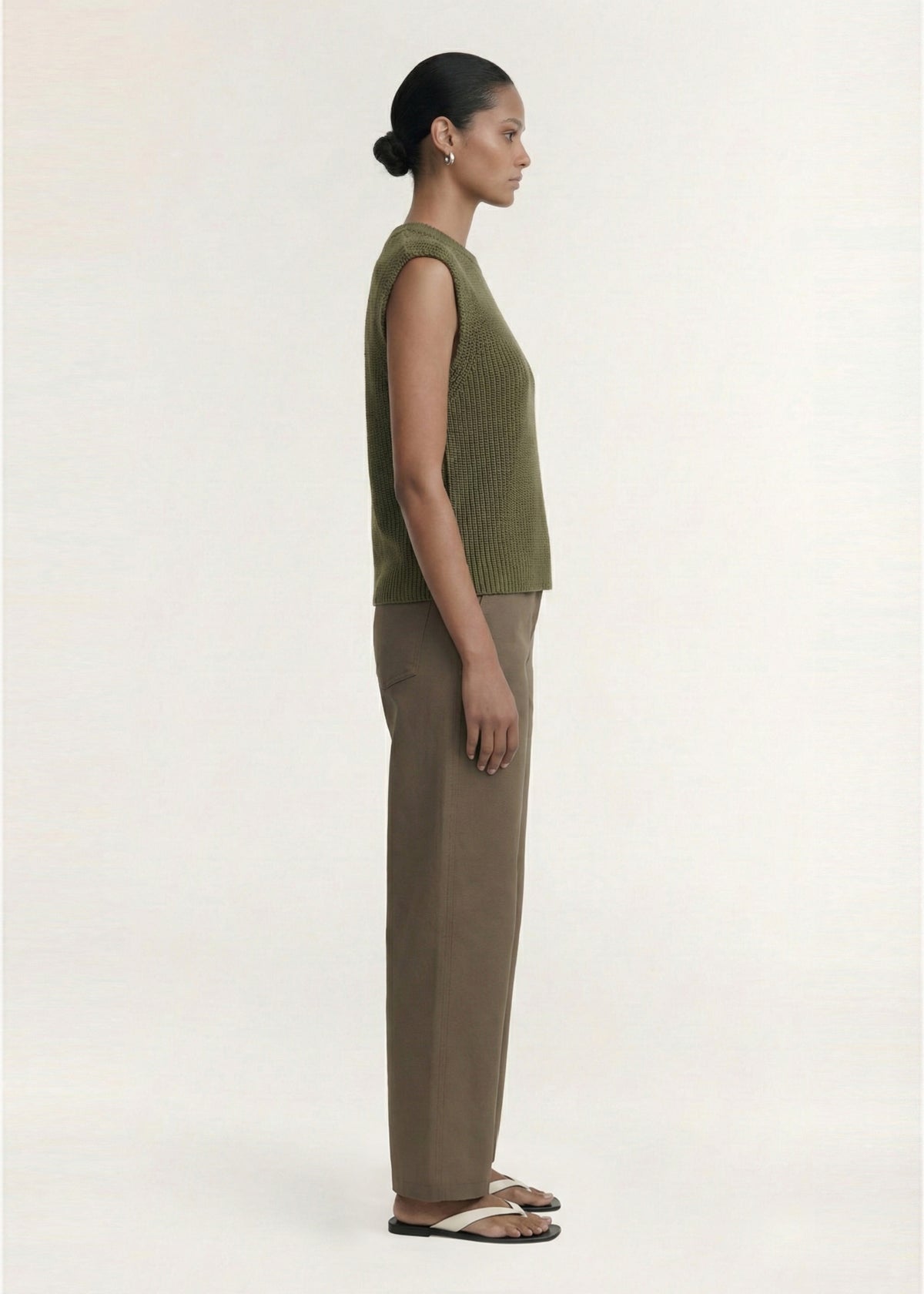 Side profile of the Khaki Cotton Blend Knit Tank Top with a ribbed hem and neckline detailing.