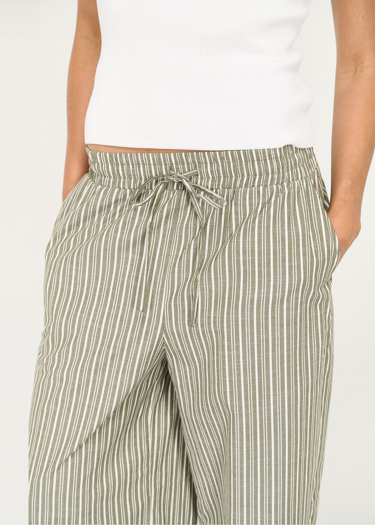 Close-up detail of the Khaki Stripe Relaxed Cotton Pant, showing drawstring waistband.