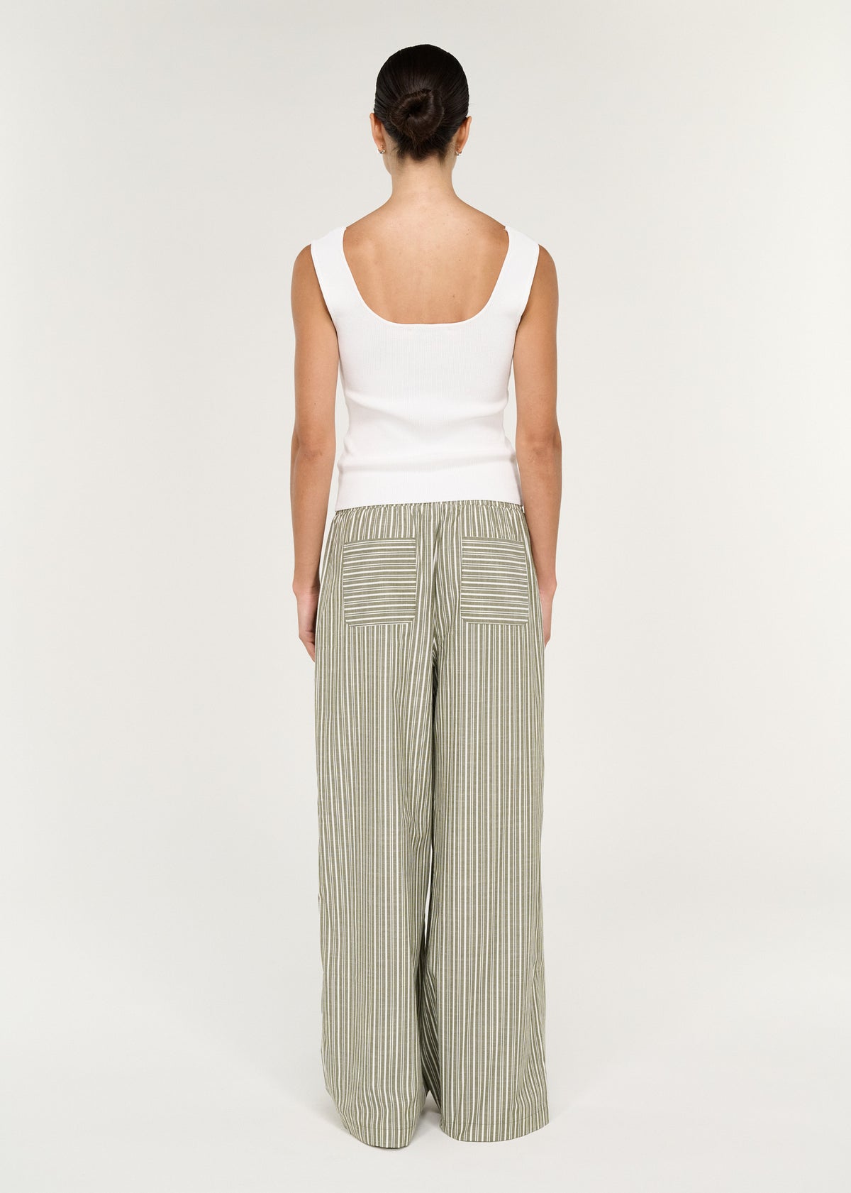 Back view of the Khaki Stripe Relaxed Cotton Pant with an adjustable drawstring tie and back patch pockets.