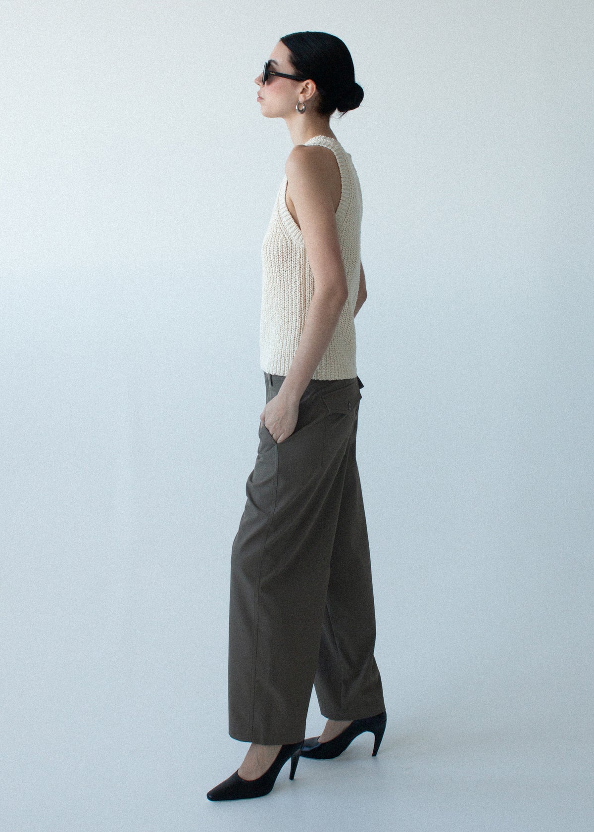 Side view of the Khaki Structured Barrel Leg Pant, showing a back patch pockets with flap detail and a clean tailored finish.