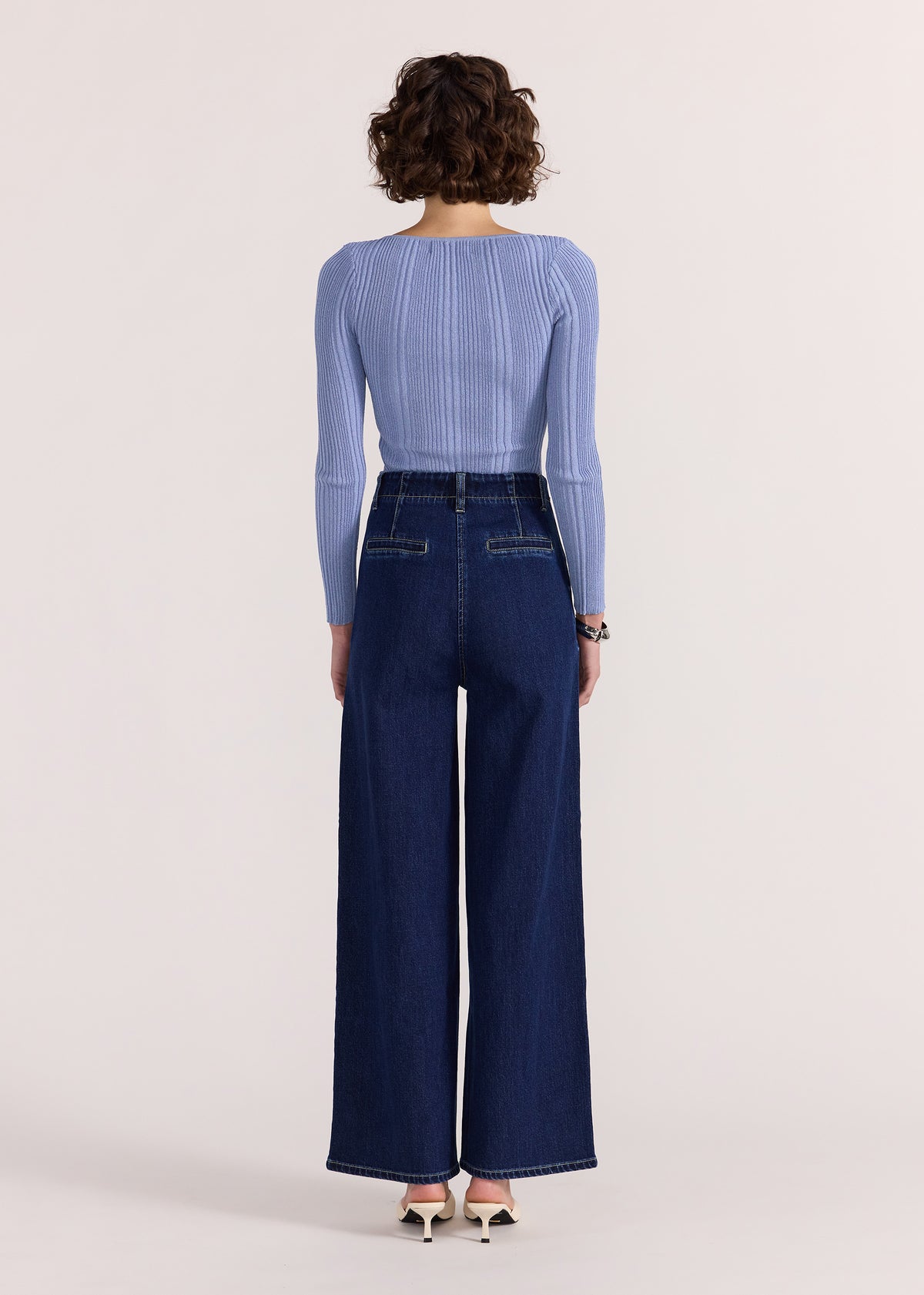Back view of the Lennox High Waist Jeans with a button and zip fly closure.